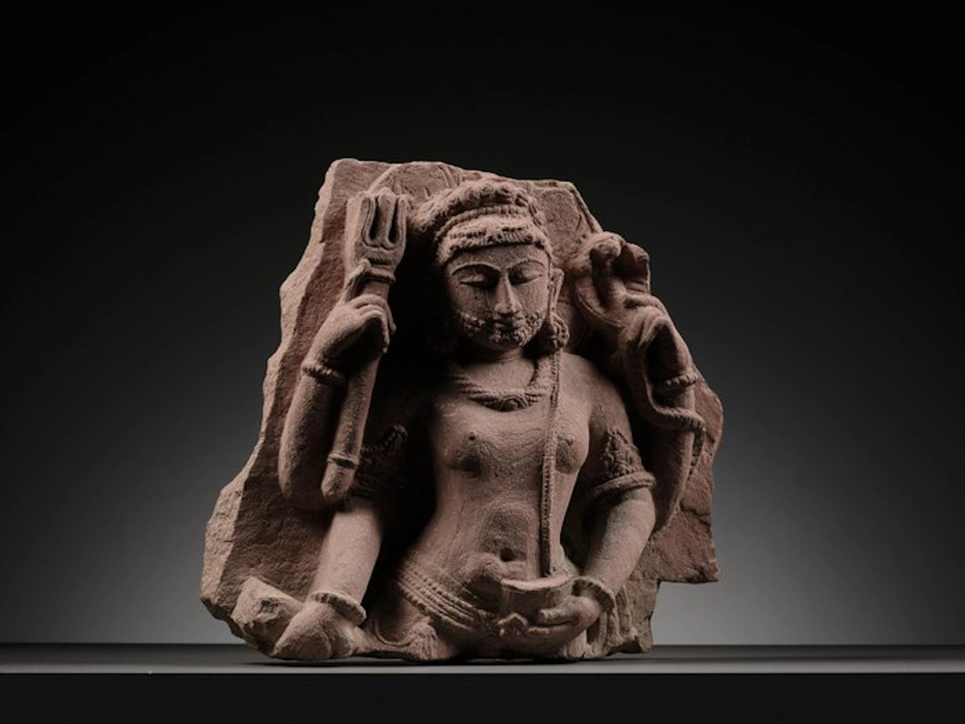 inde red sandstone Relief in red sandstone depicting a Shaivite guardian