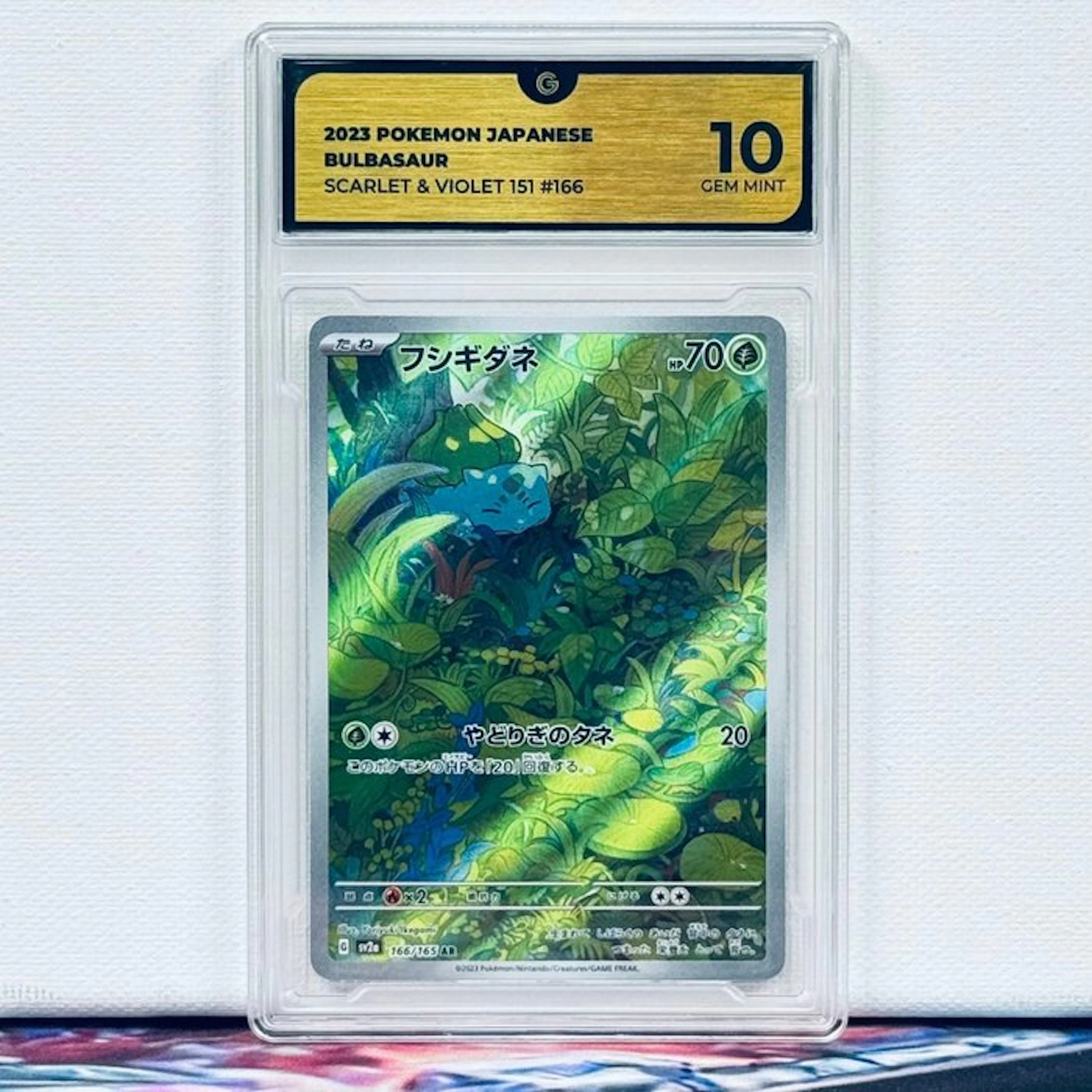 Pokémon Graded card - BULBASAUR 166 - Pokémon - GG 10
