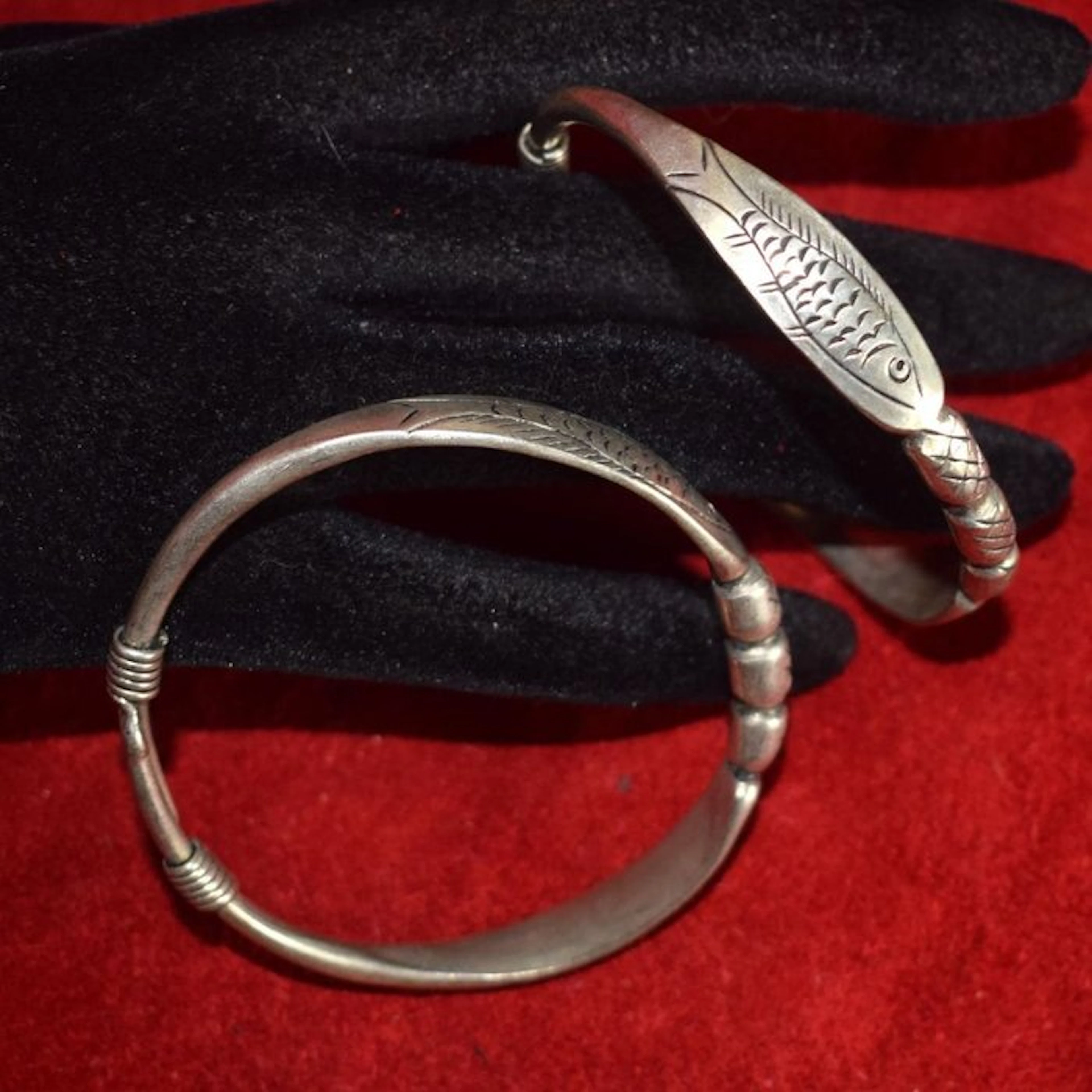 Pair of two fish-motif bracelets