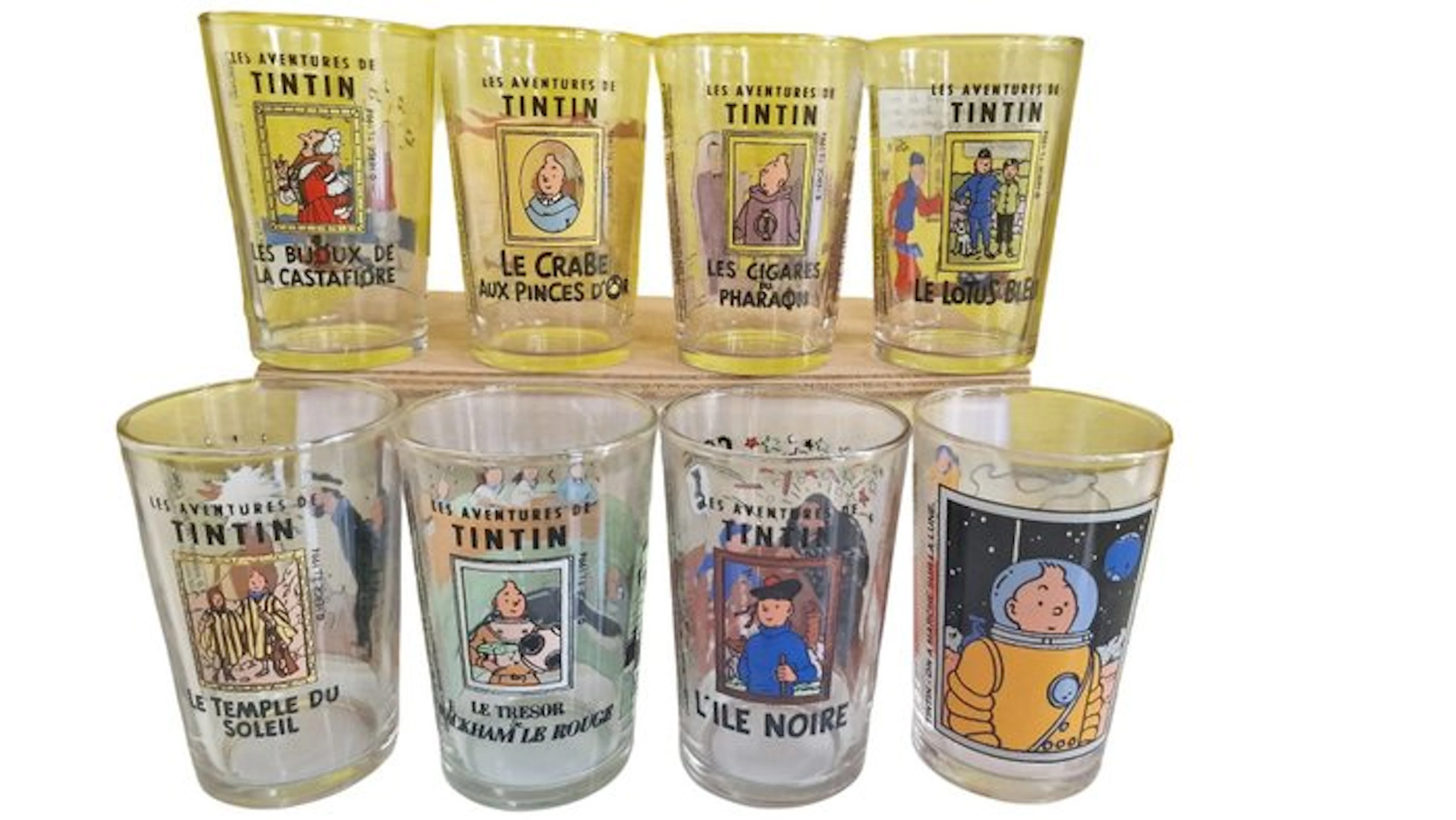 Tintin - 8 Tintin - Collection of 8 mustard-colored...