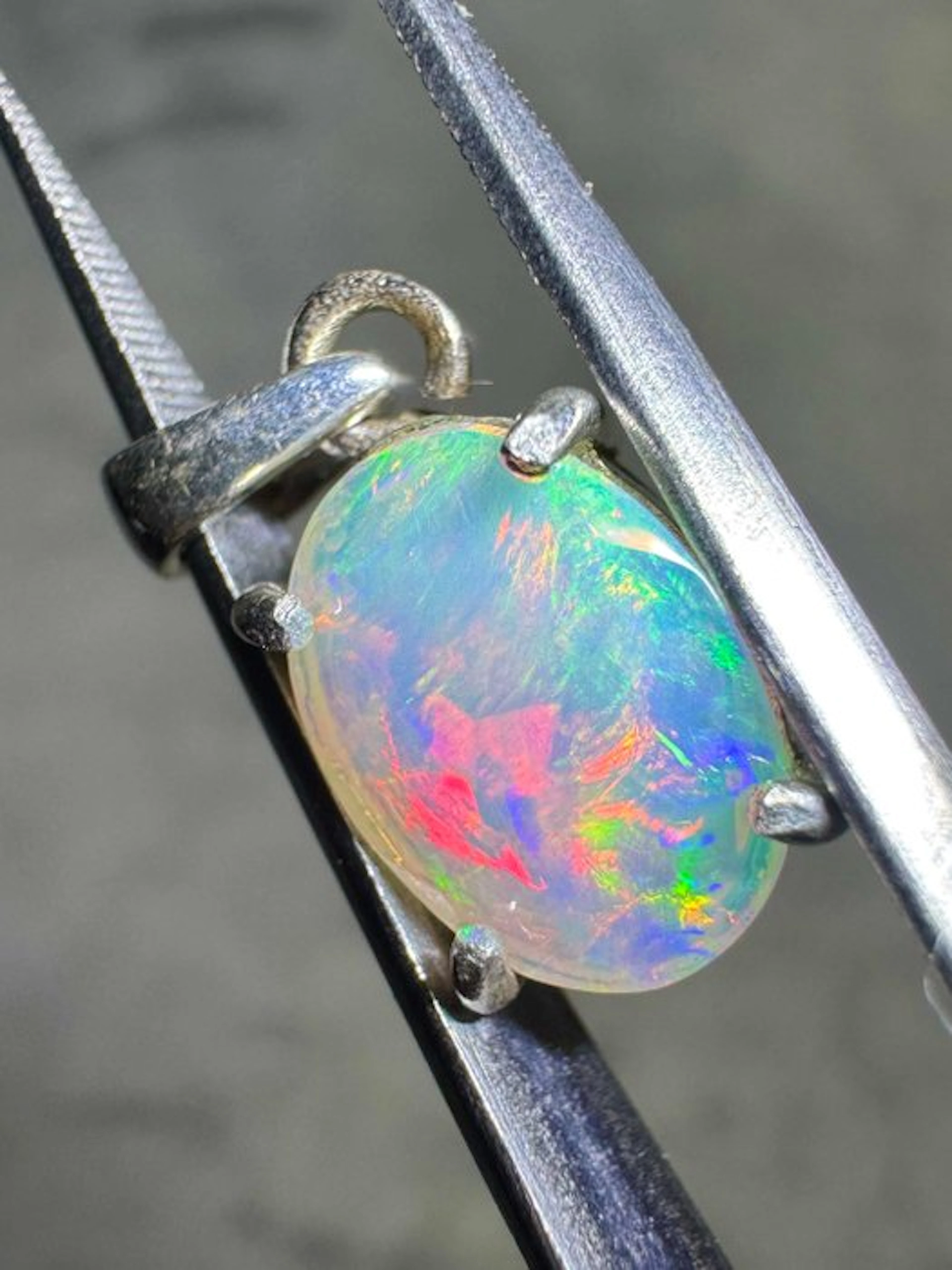 Faceted white opal pendant from Ethiopia + 925 sterling...