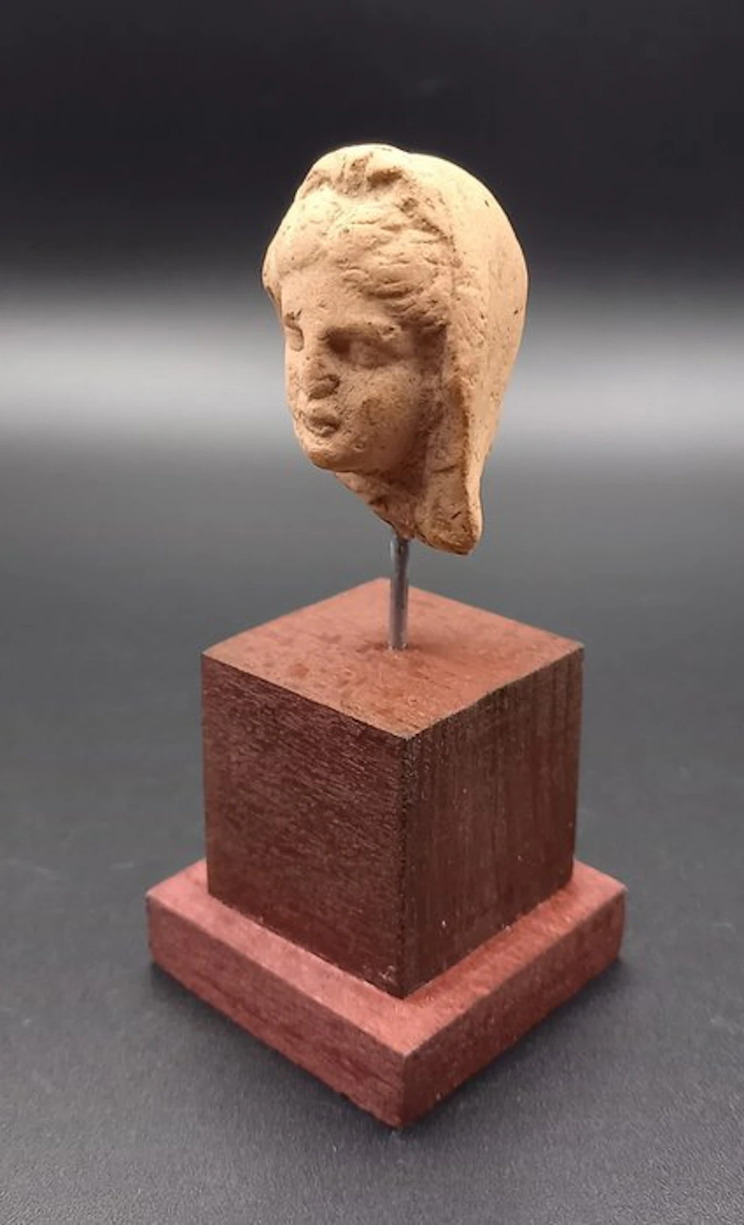 Ancient Greek, Hellenistic Terracotta Head of a woman wearing a veil. - 40 mm