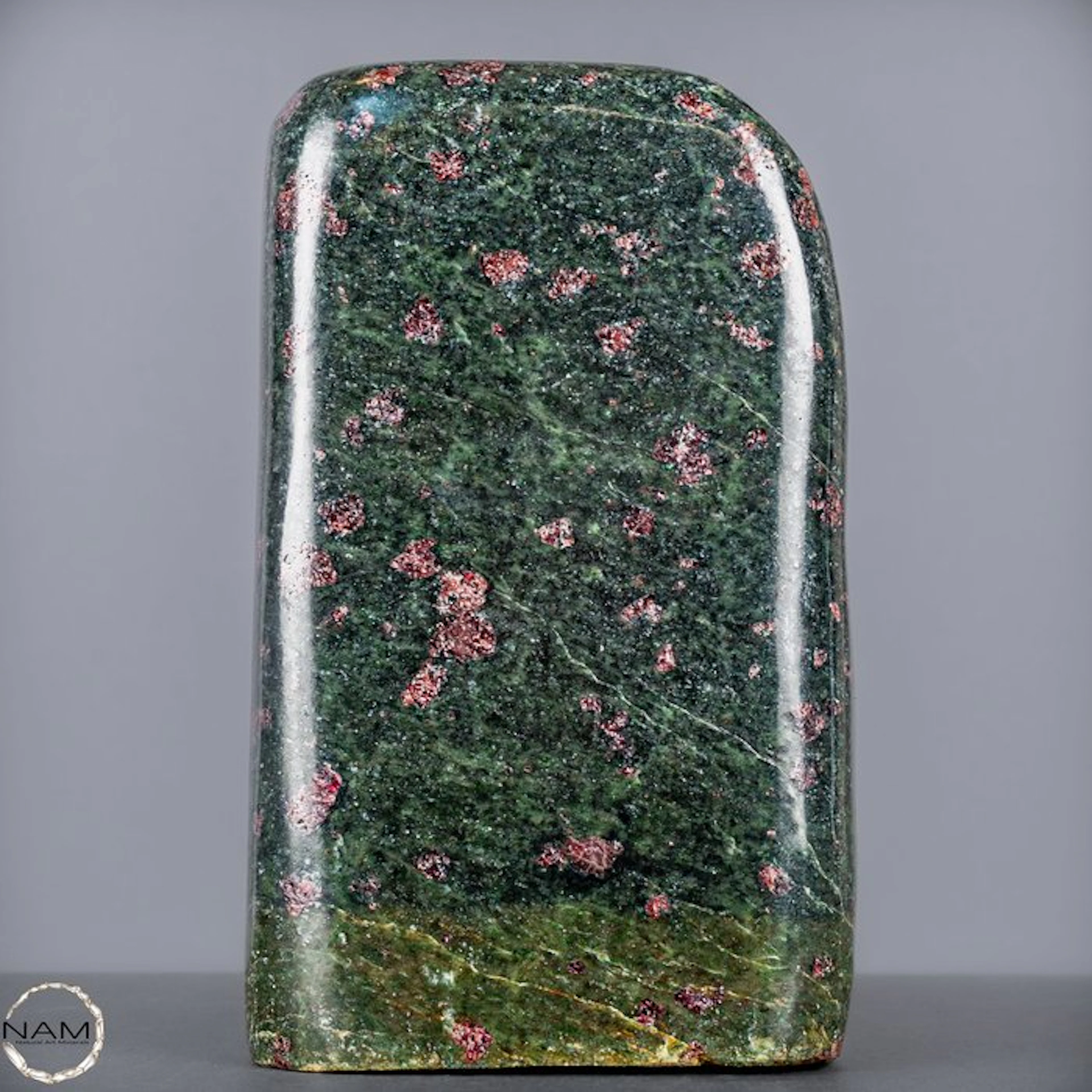 Natural almandine garnet in a green matrix – Powerful...