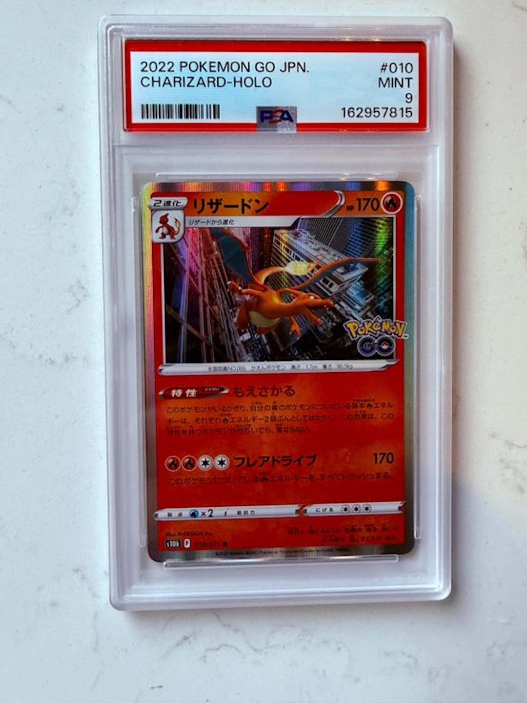 Pokémon - 1 Graded card - Charizard #010 Foil, Promo card - PSA 9