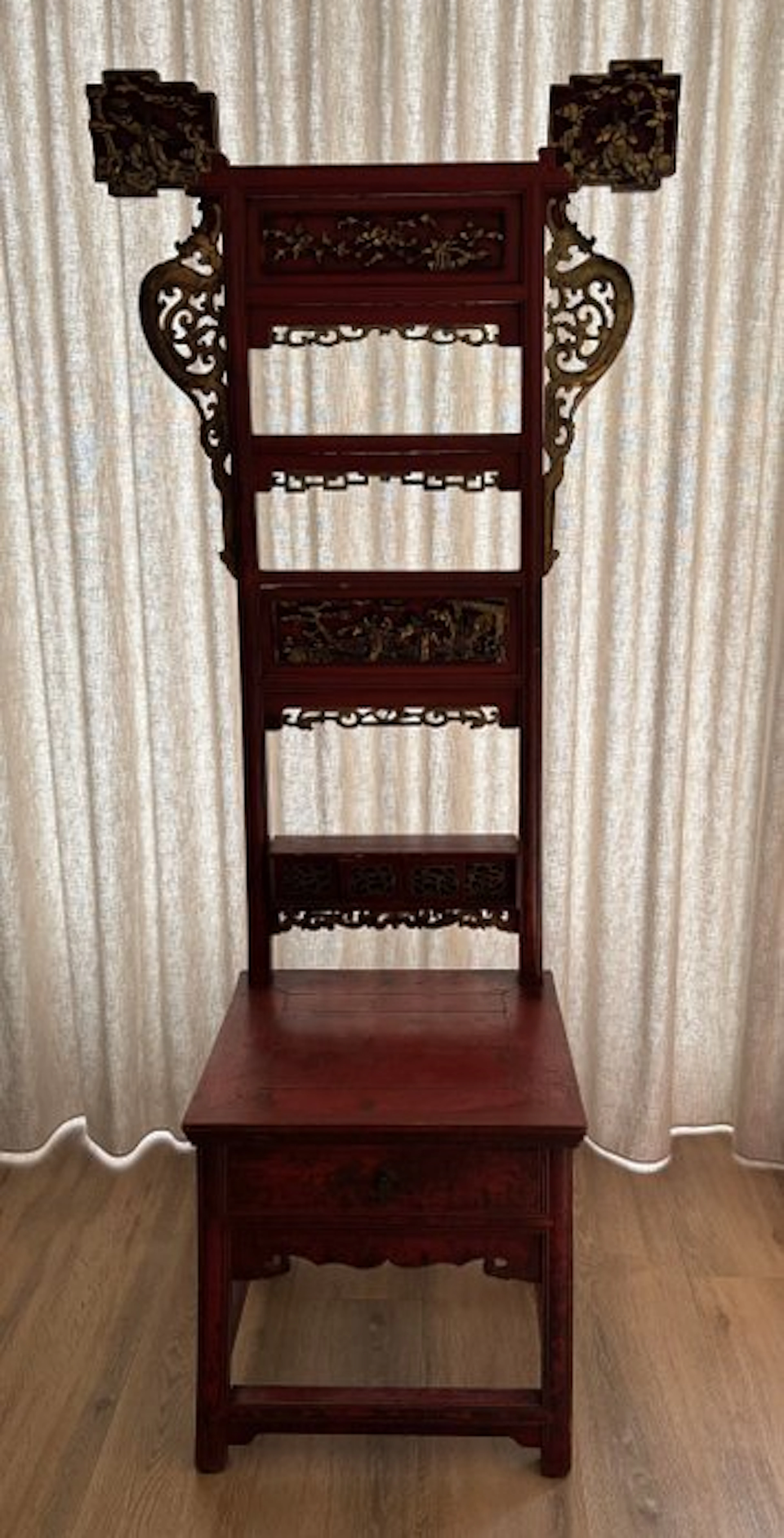 An antique Chinese red lacquer and gilded washbasin stand...