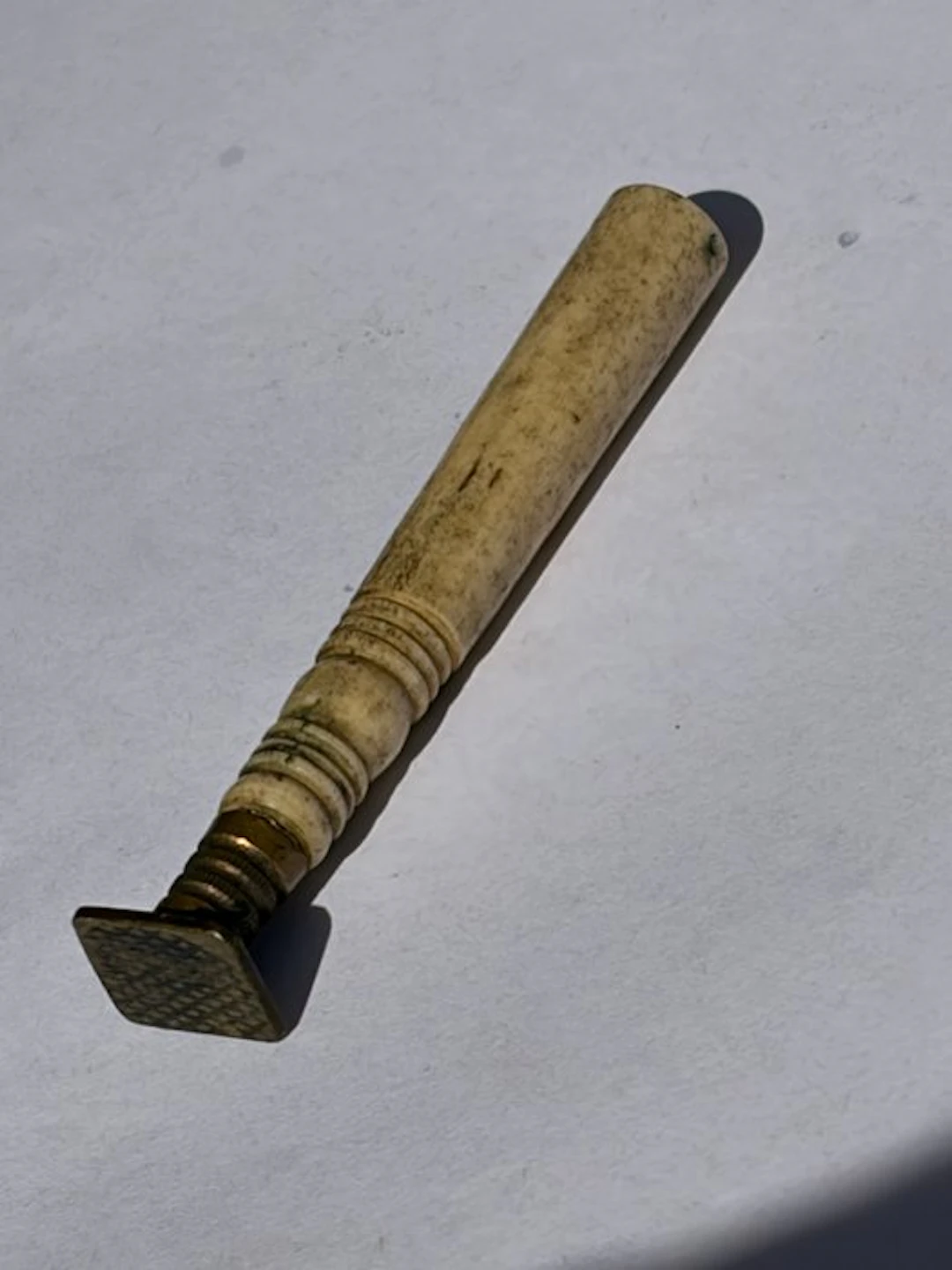 Portable wafer seal in bone and brass with virgin matrix...
