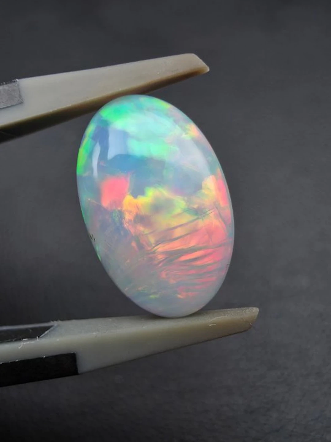 2.34cts White Opal Cabochon- 0.47 g
