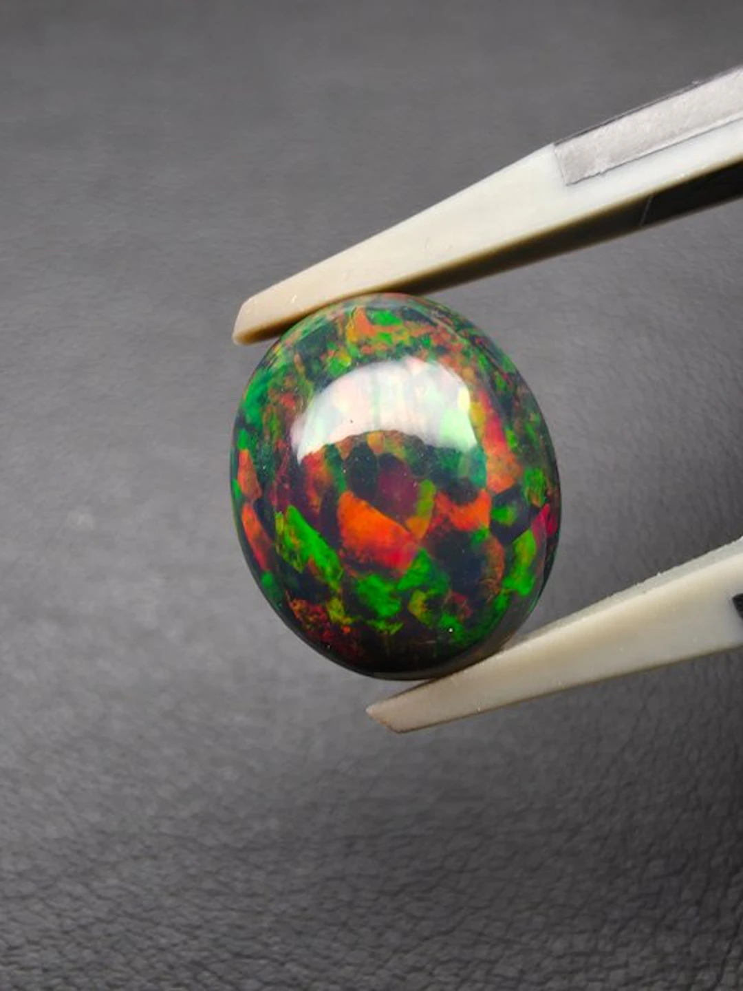 2.62 cts Black Opal Cabochon- 0.52 g
