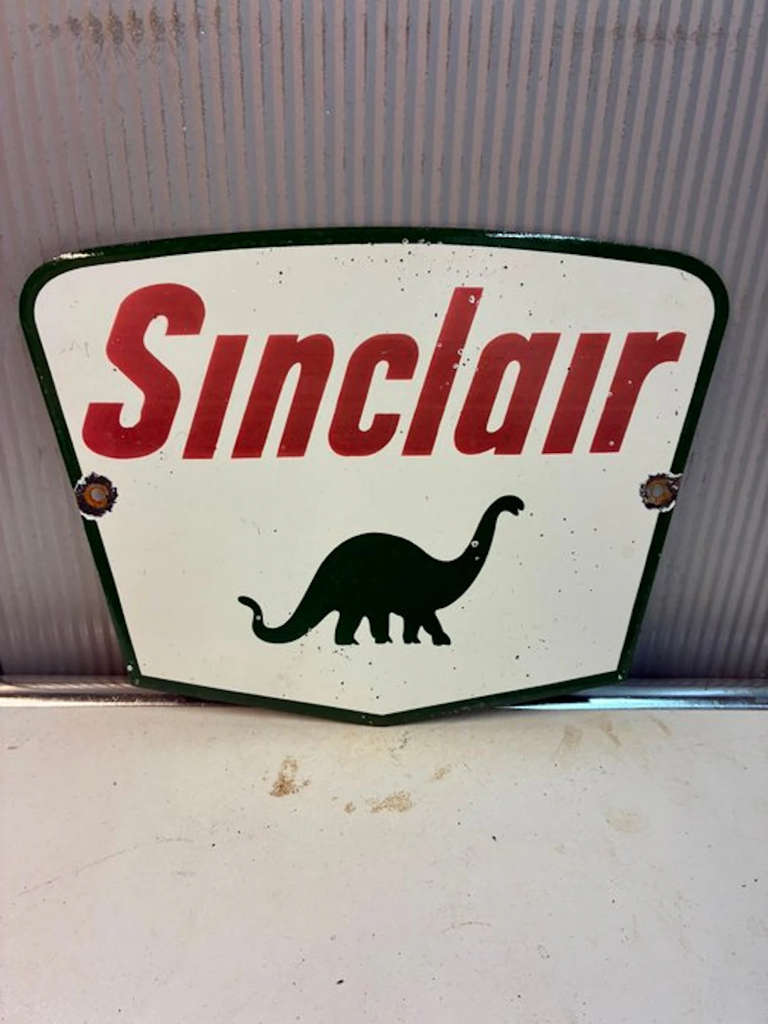 Sinclair Dinosaur – Enamel advertising sign – Shield...
