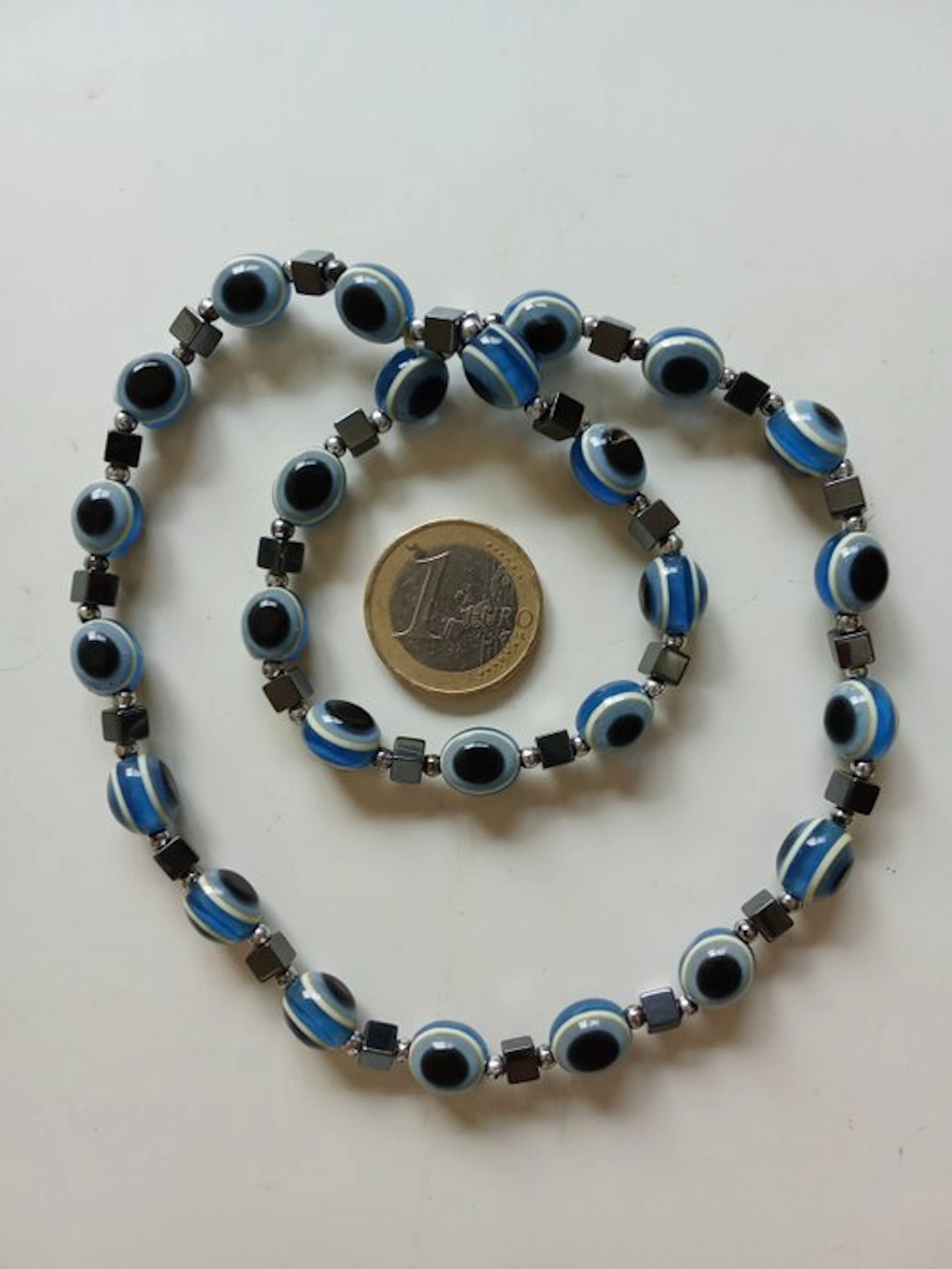 oval Turkish eye bead 10 mm x 8 mm 22.5 cm stretchable 22 grams oval bead