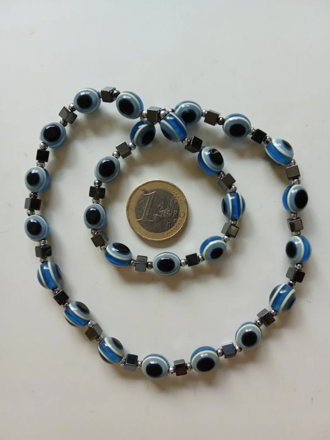 oval Turkish eye bead 10 mm x 8 mm 22.5 cm stretchable 22 grams oval bead