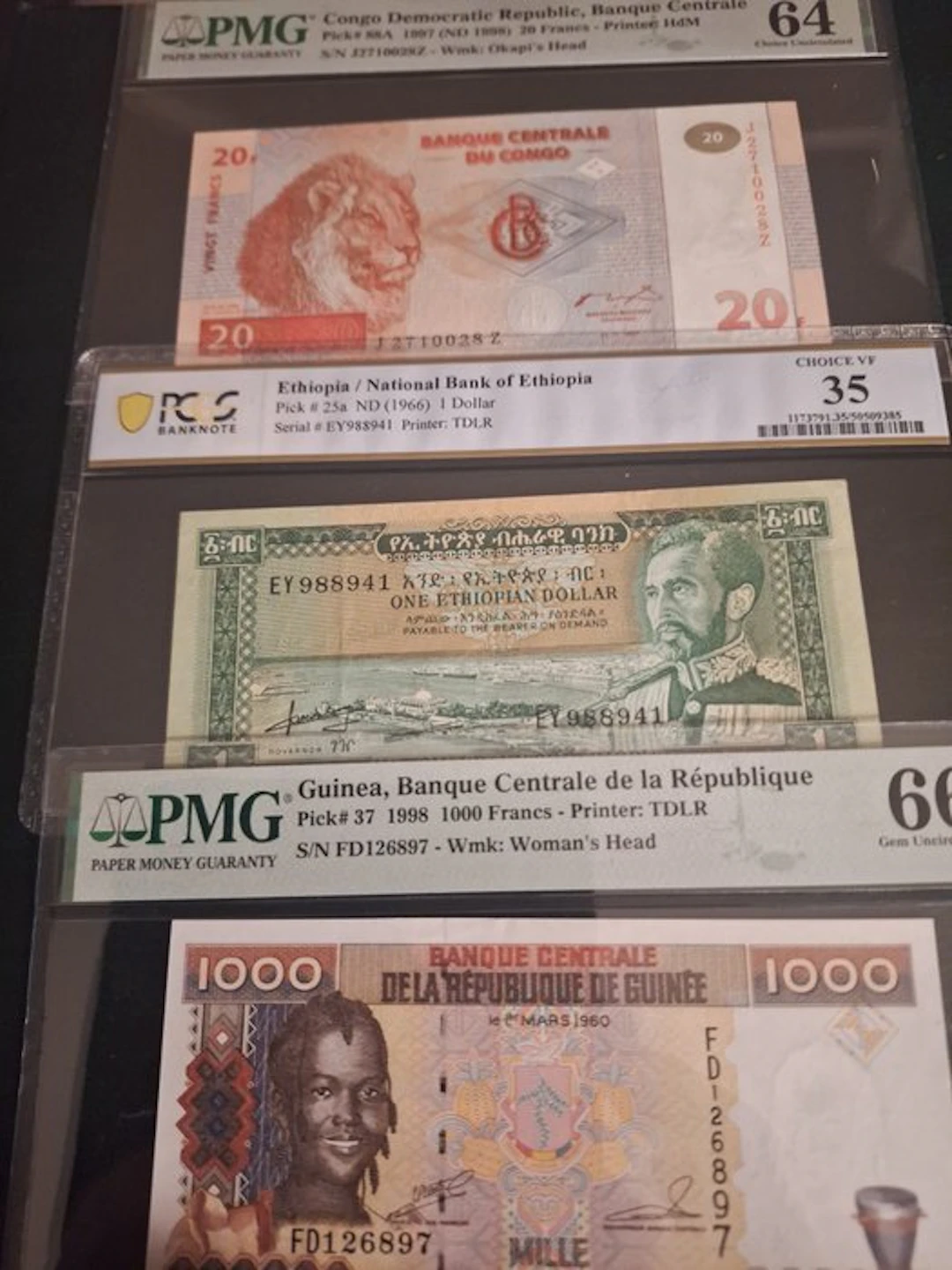 World. - 3 banknotes - all graded - various dates (No reserve price)