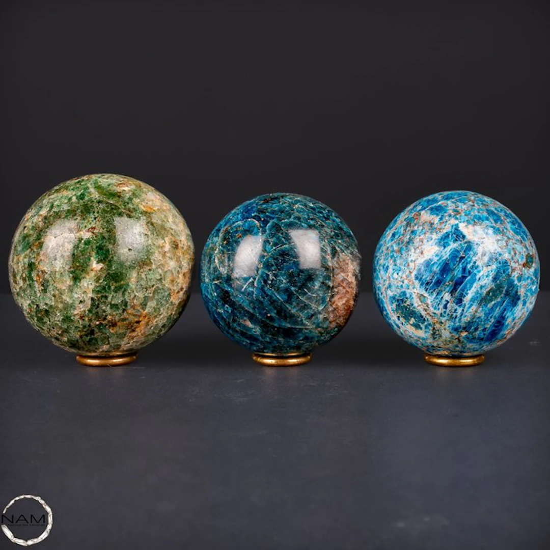 Natural apatite spheres – Set of three spheres in intense...