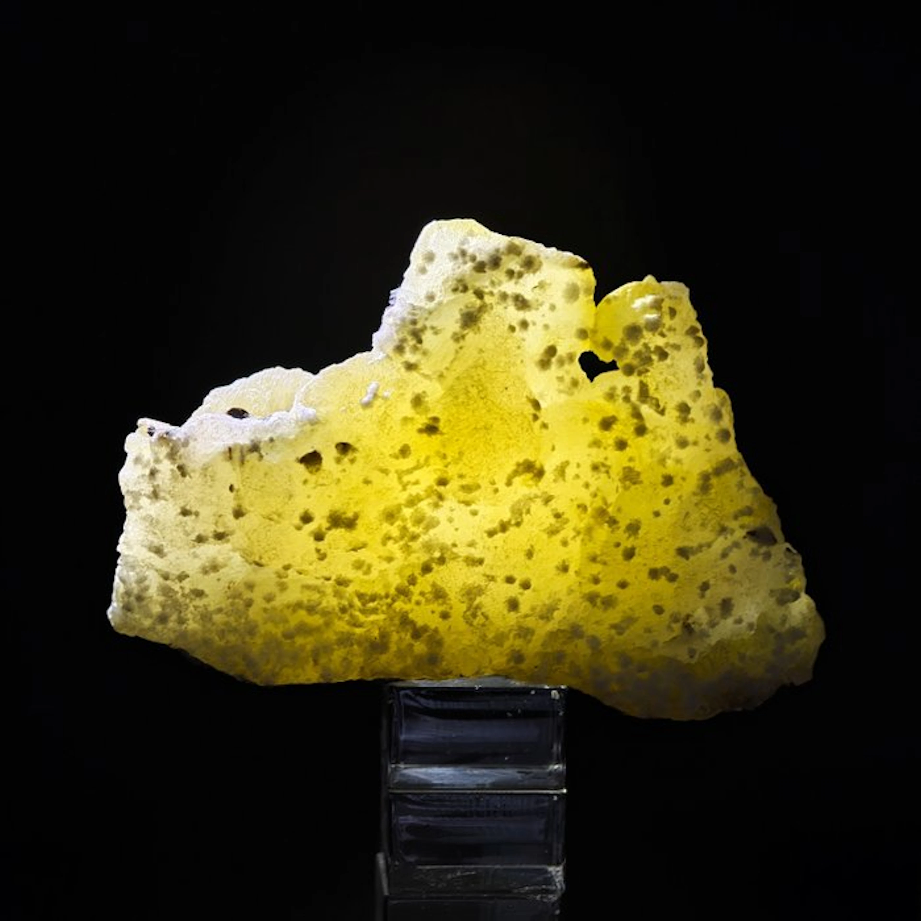 Rare yellow brucite snow-covered with white minerals