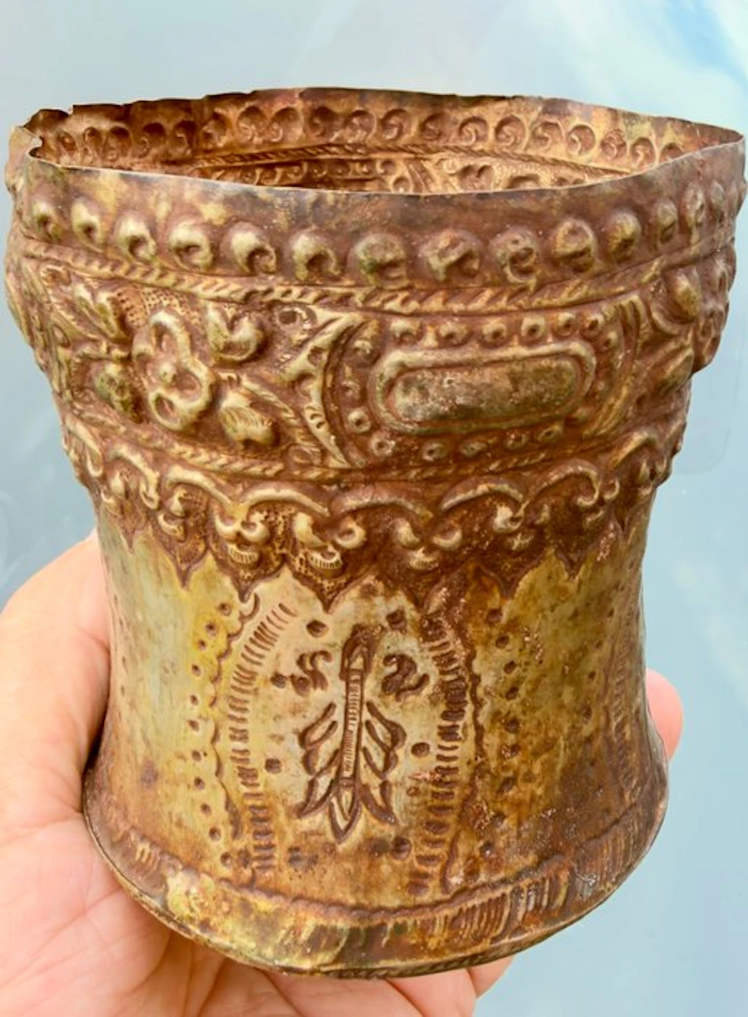 Decorated brass vessel