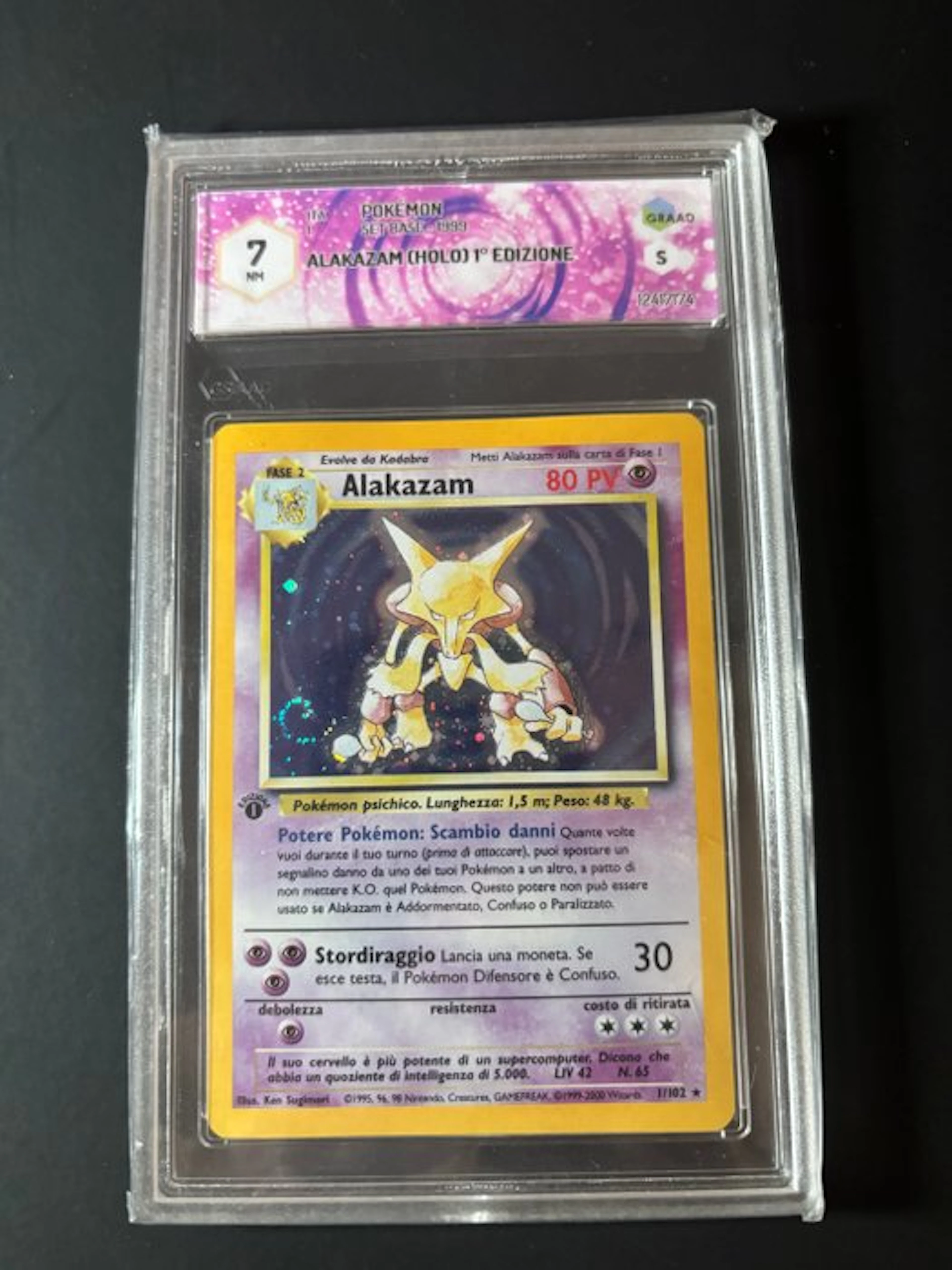 Pokémon - 1 Graded card - Alakazam 1/102 First edition