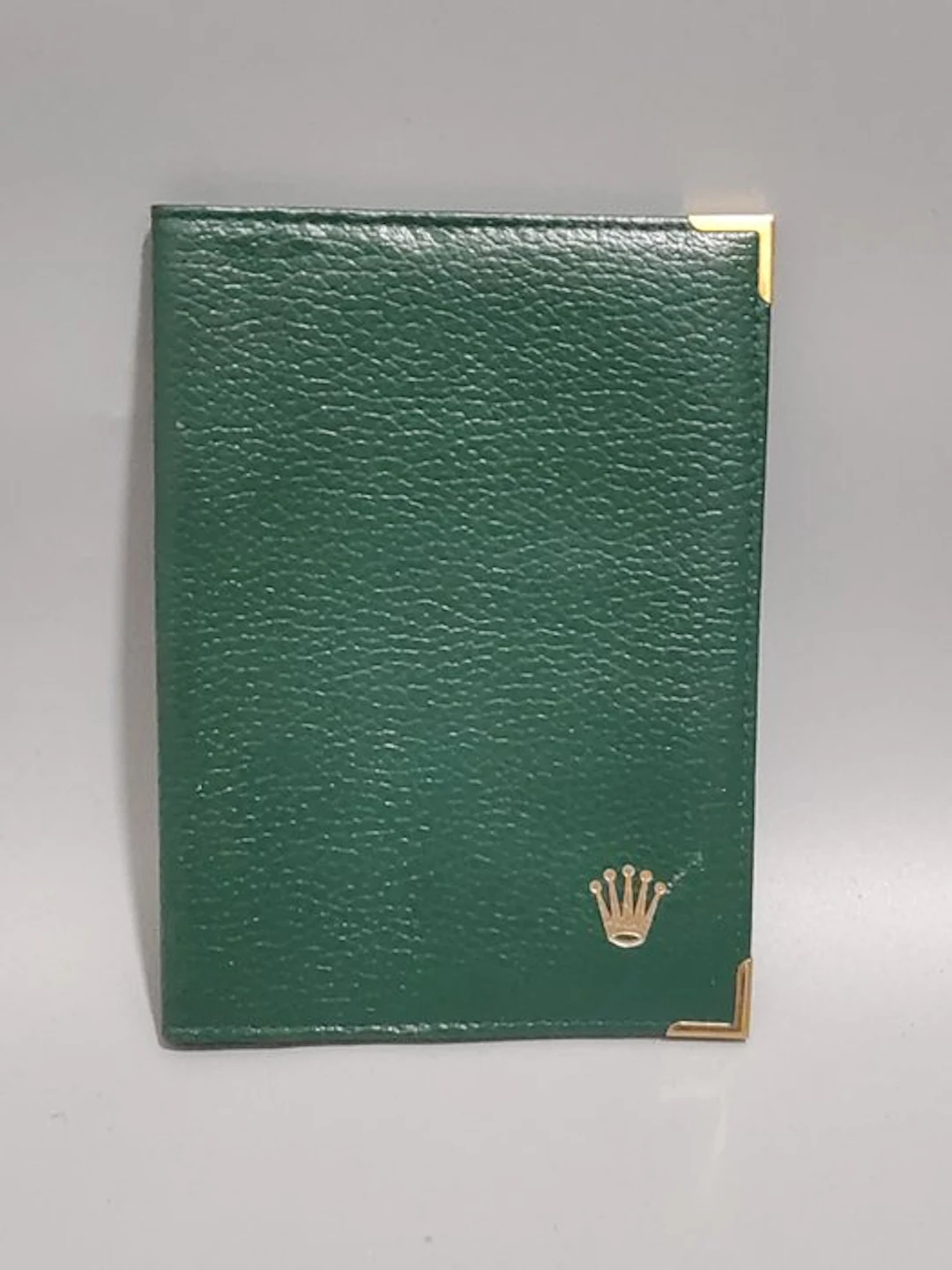Rolex - Rolex bi-fold wallet in deep green grained cowhide leather