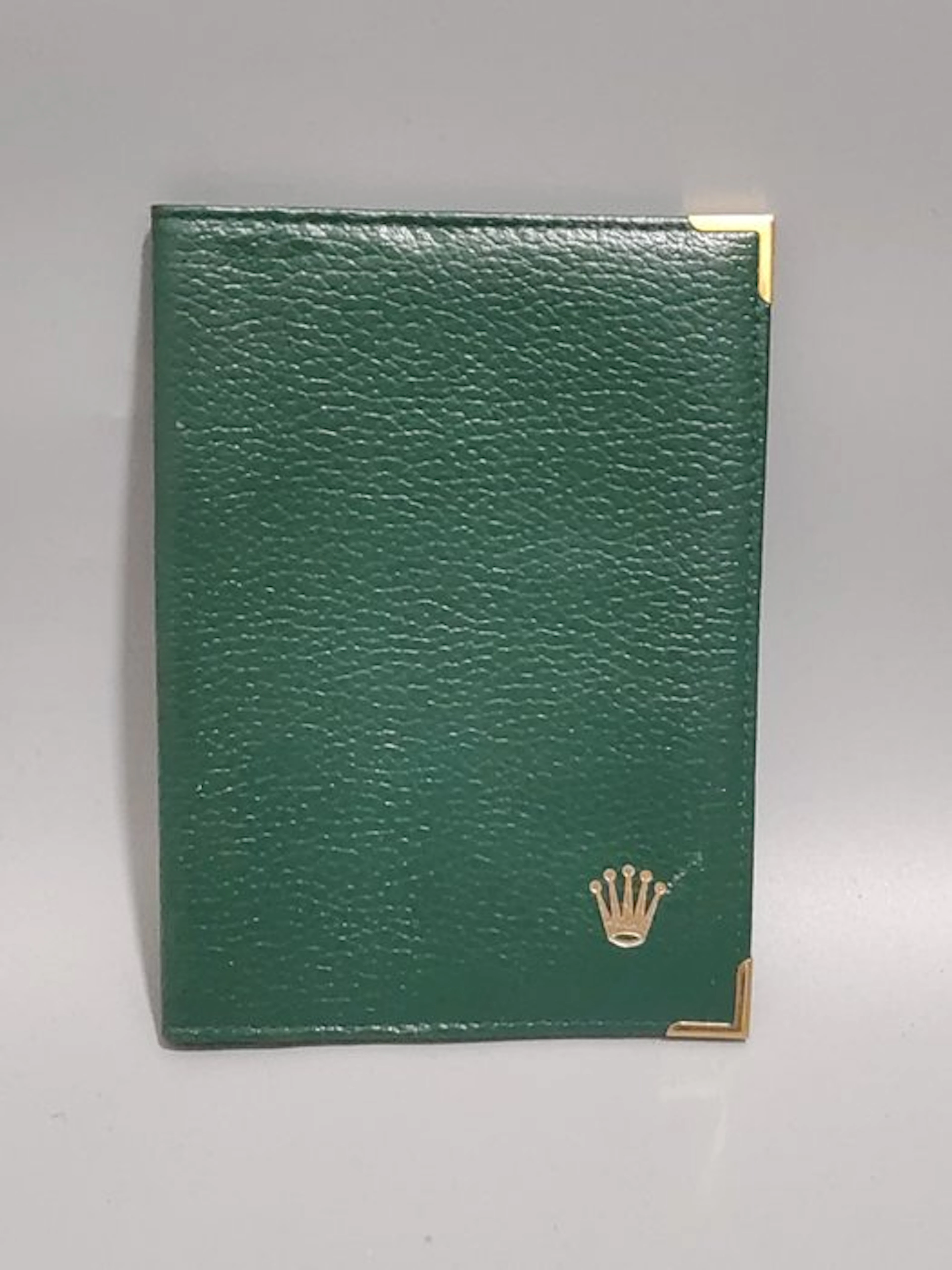 Rolex - Rolex bi-fold wallet in deep green grained cowhide leather
