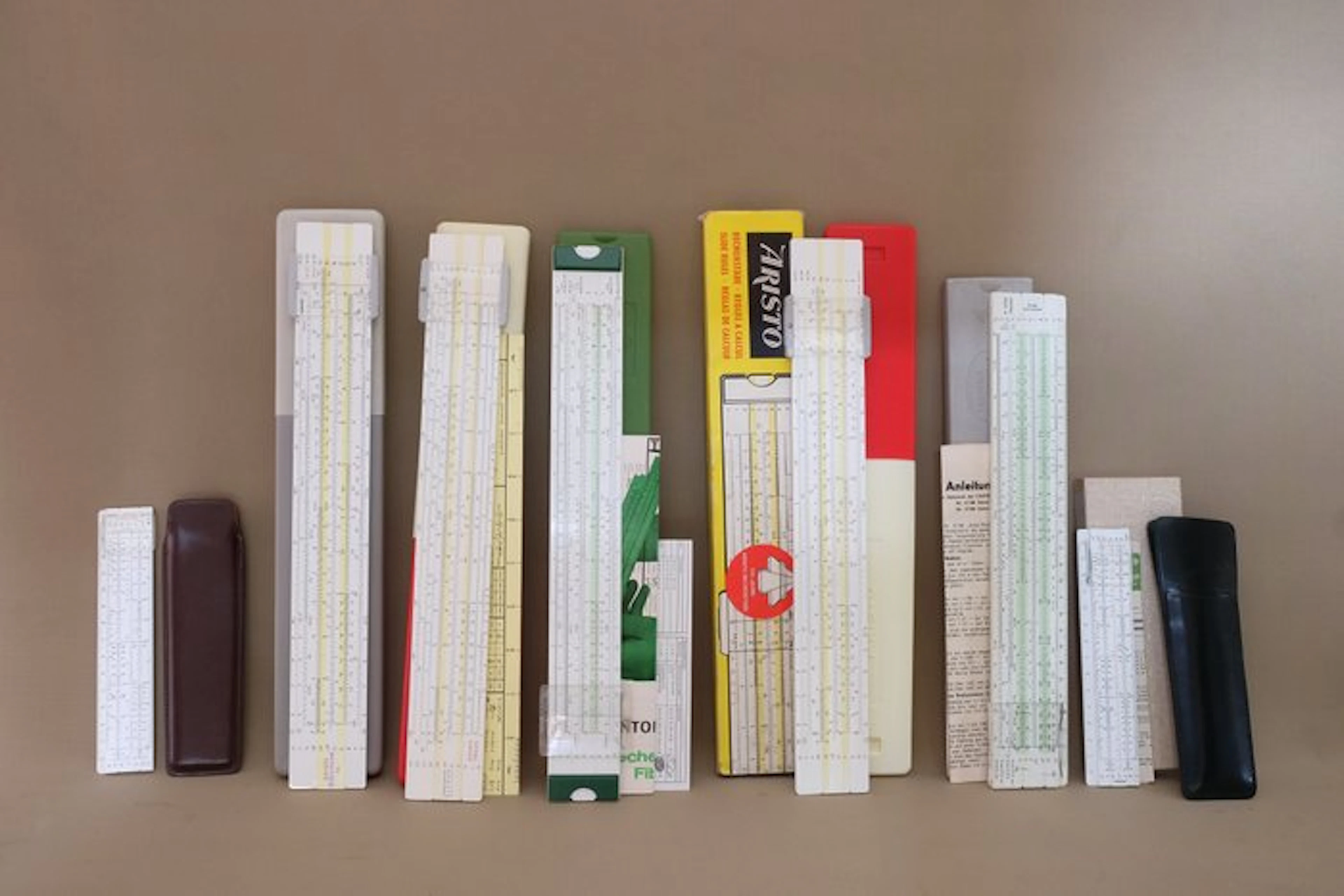 Aristo, Castell - Slide rule - Seven vintage slide rules...