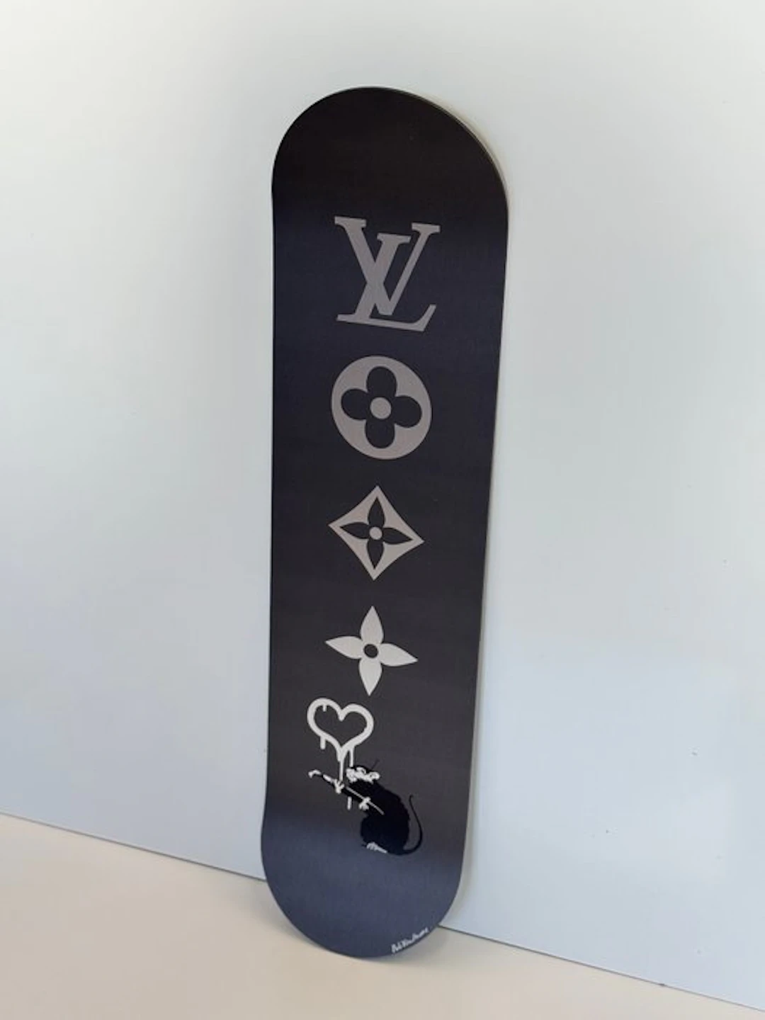 Rob VanMore - Skating by LV x Banksy Rat