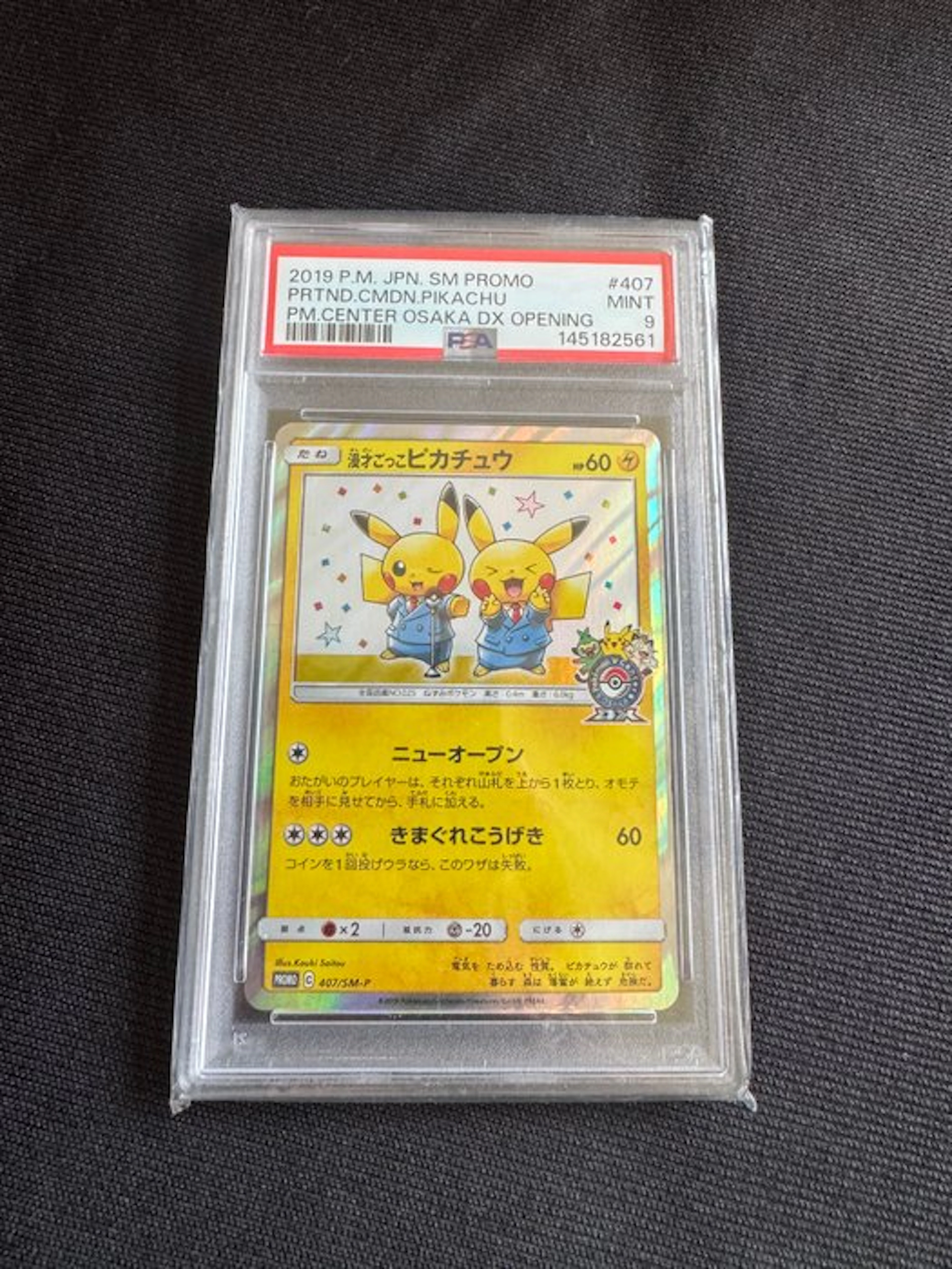 Pokémon - 1 Graded card - Pikachu 407/SM-P Promo card
