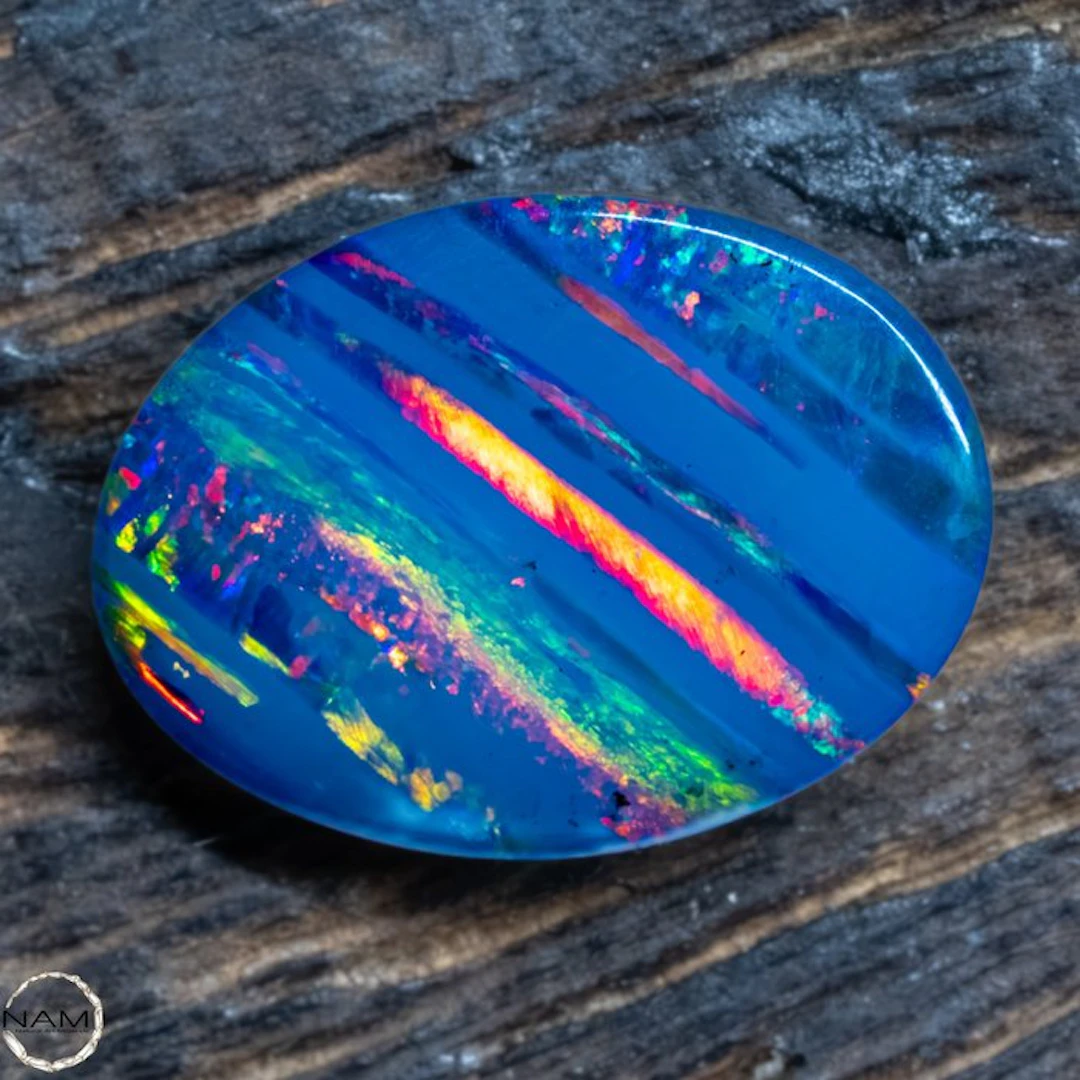 Triplett-Opal with glowing color veins – expressive blue...
