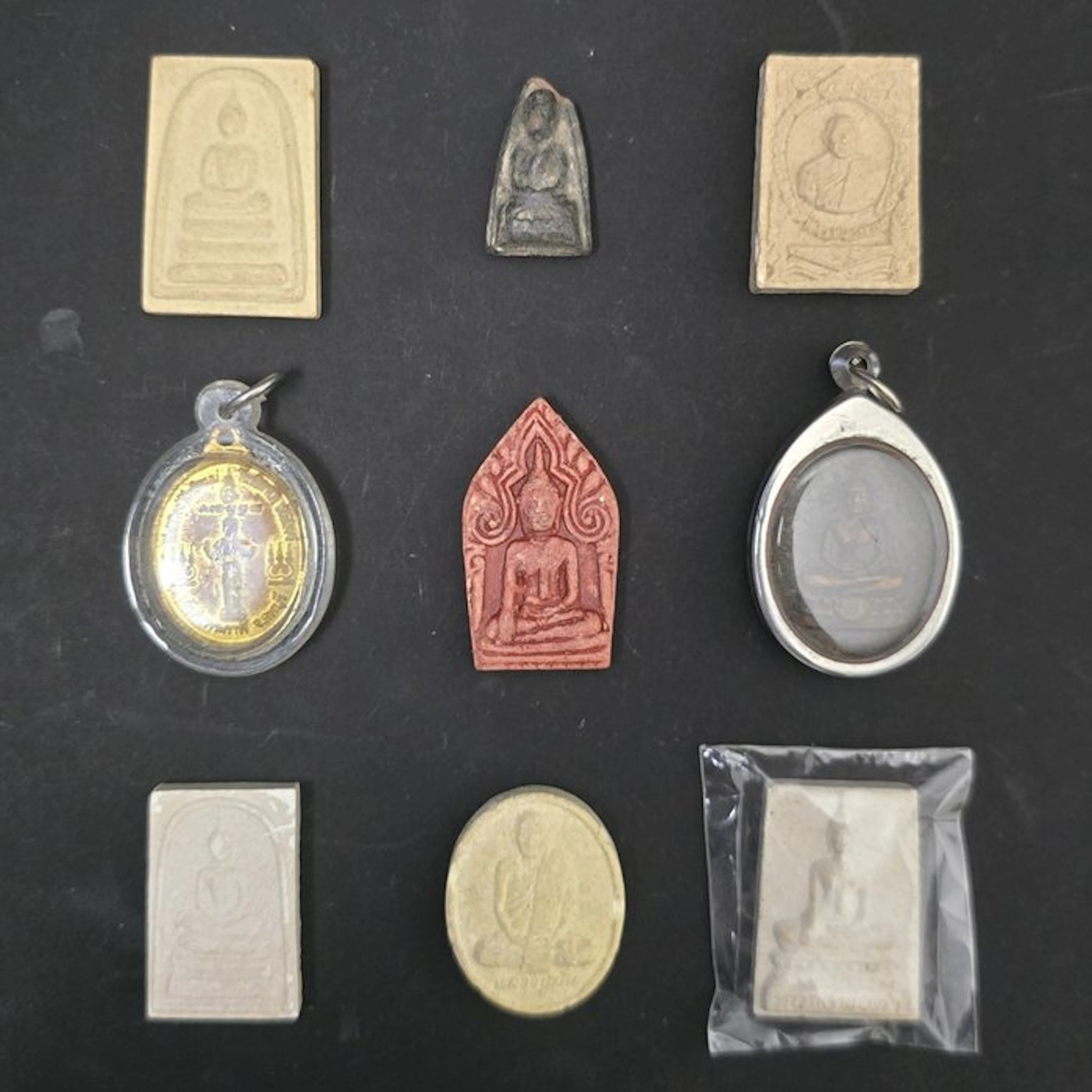 Thailand. 9 verschillende Thaise Boeddhistische Amuletten (No reserve price)