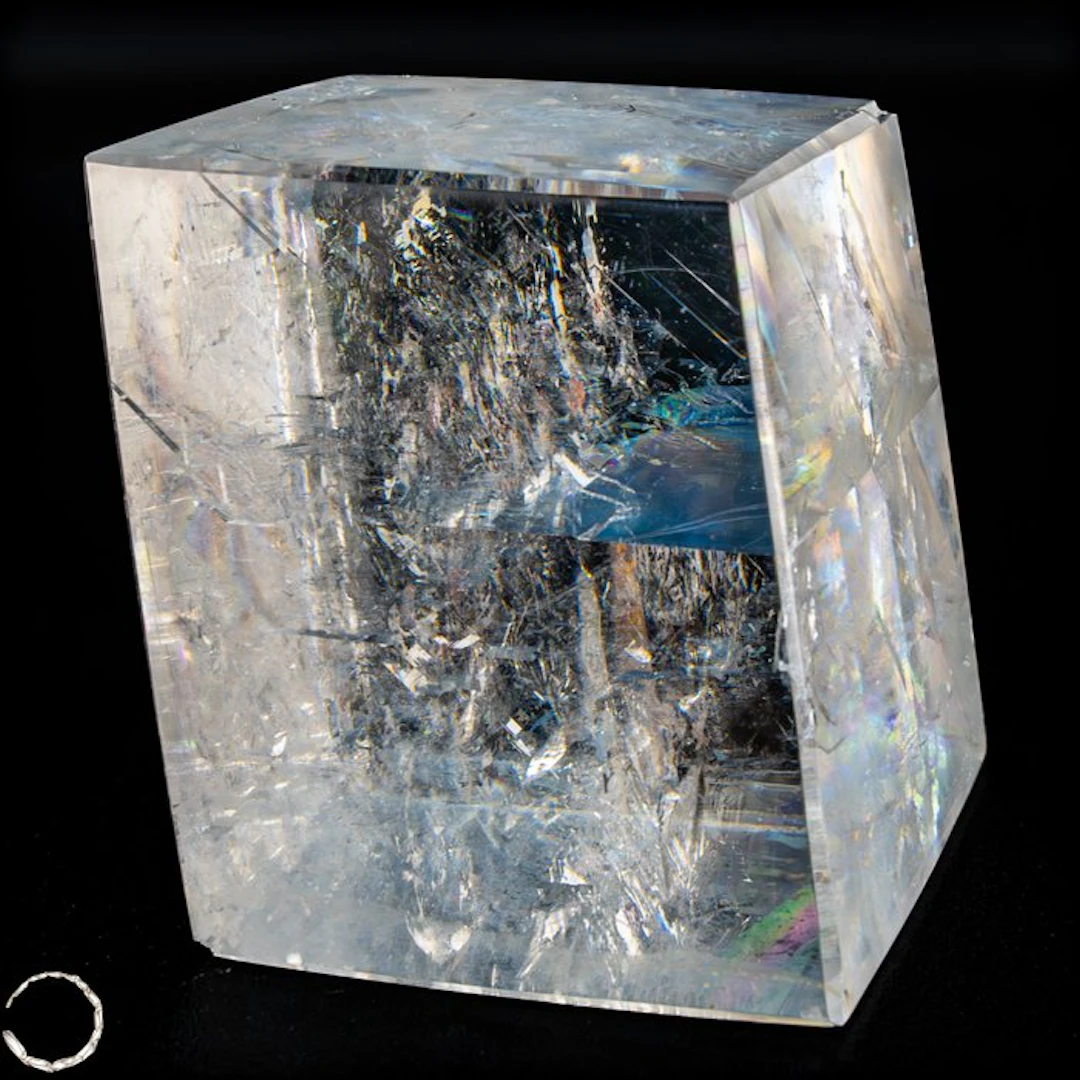Natural optical calcite – Clear birefringent crystal in a...