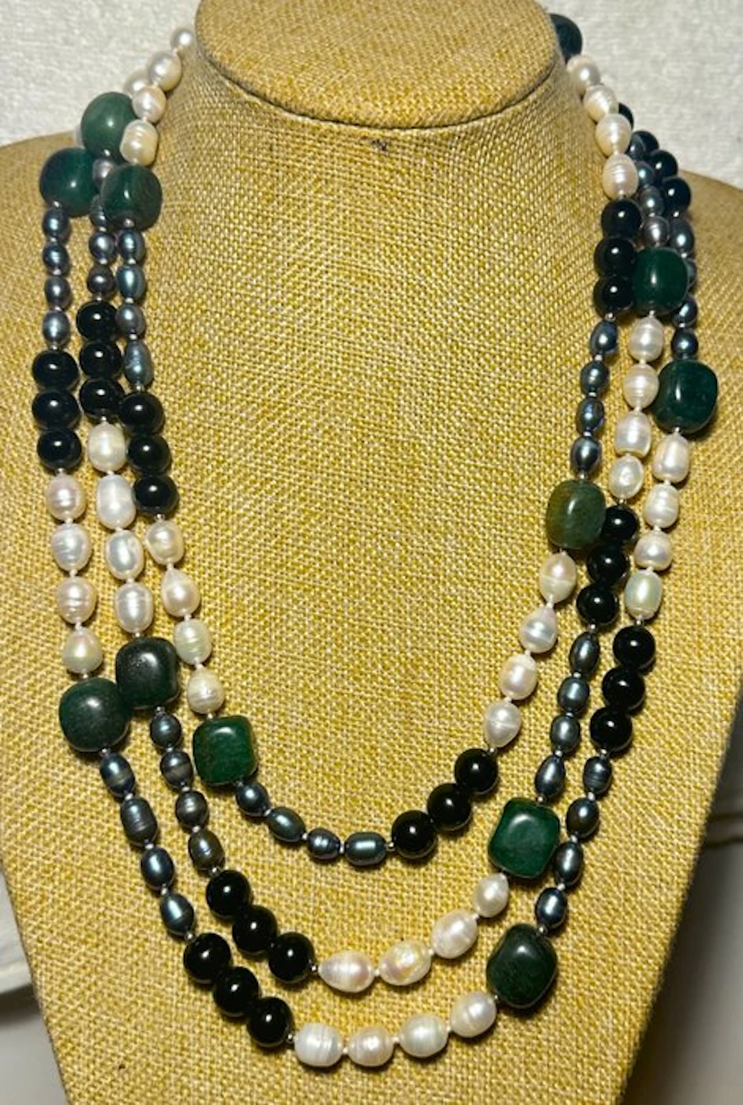 Pearls (white and gray); Green nephrite and black onyx
