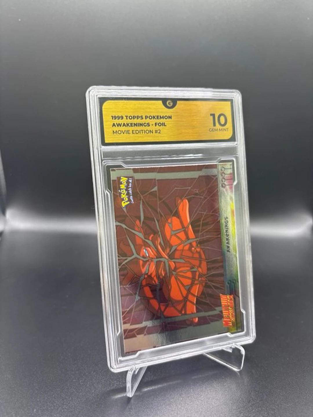 Pokémon - 1 Graded card Awakenings Topps Movie Edition Foil - GG 10