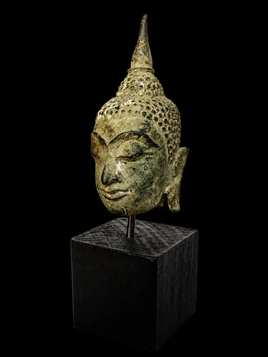 Unearthed bronze Buddha head