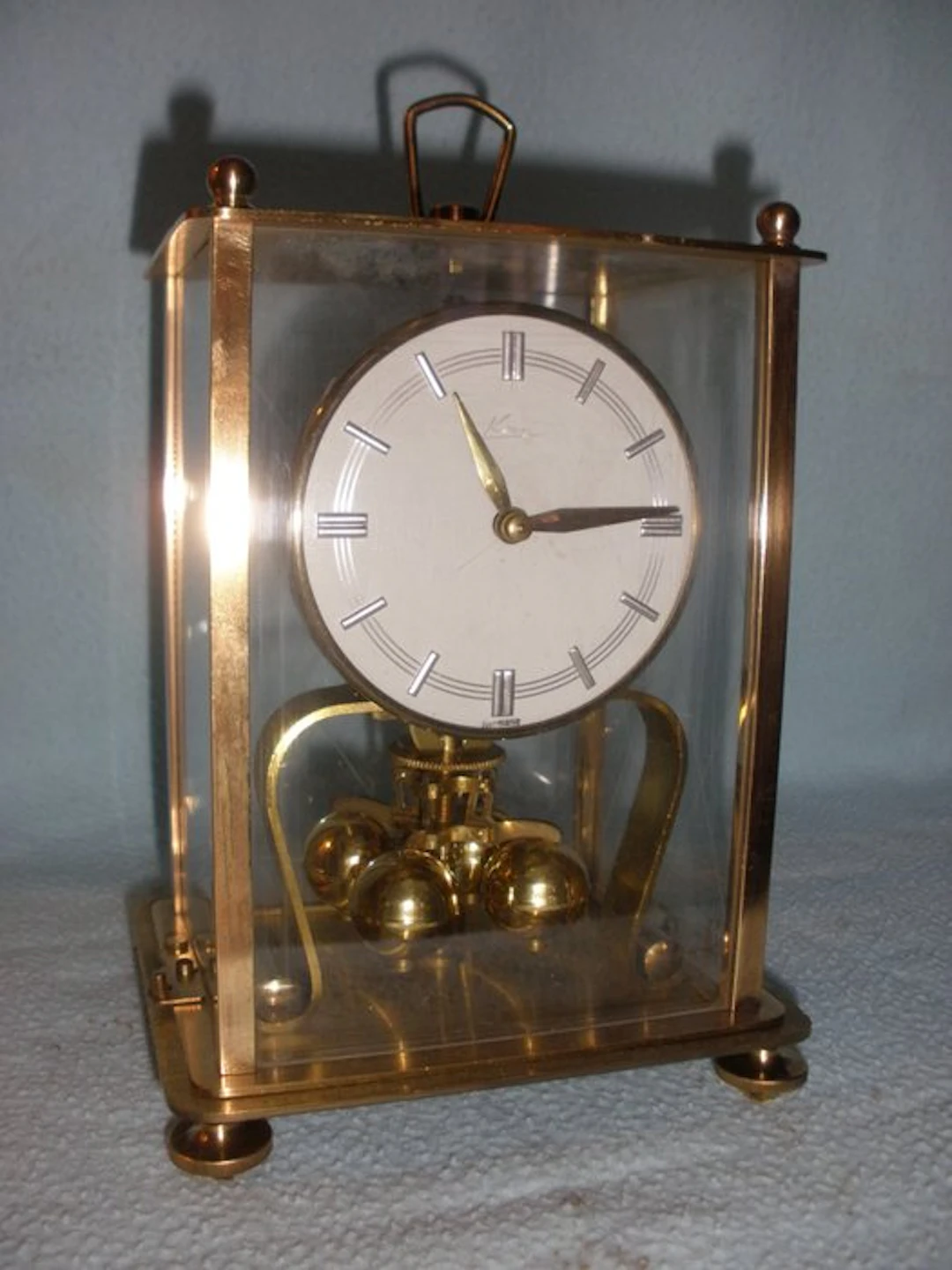 Anniversary clock - Kienzle Kern - Bauhaus Brass, Steel, Glass - 1960-1970