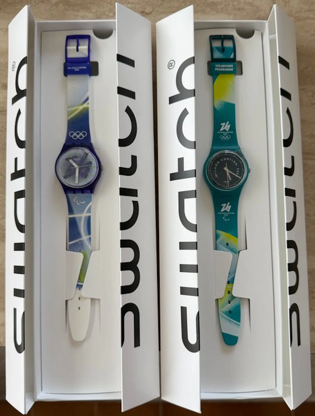 Swatch Milano Cortina 2026 – Lot de 2 montres – Chasing...