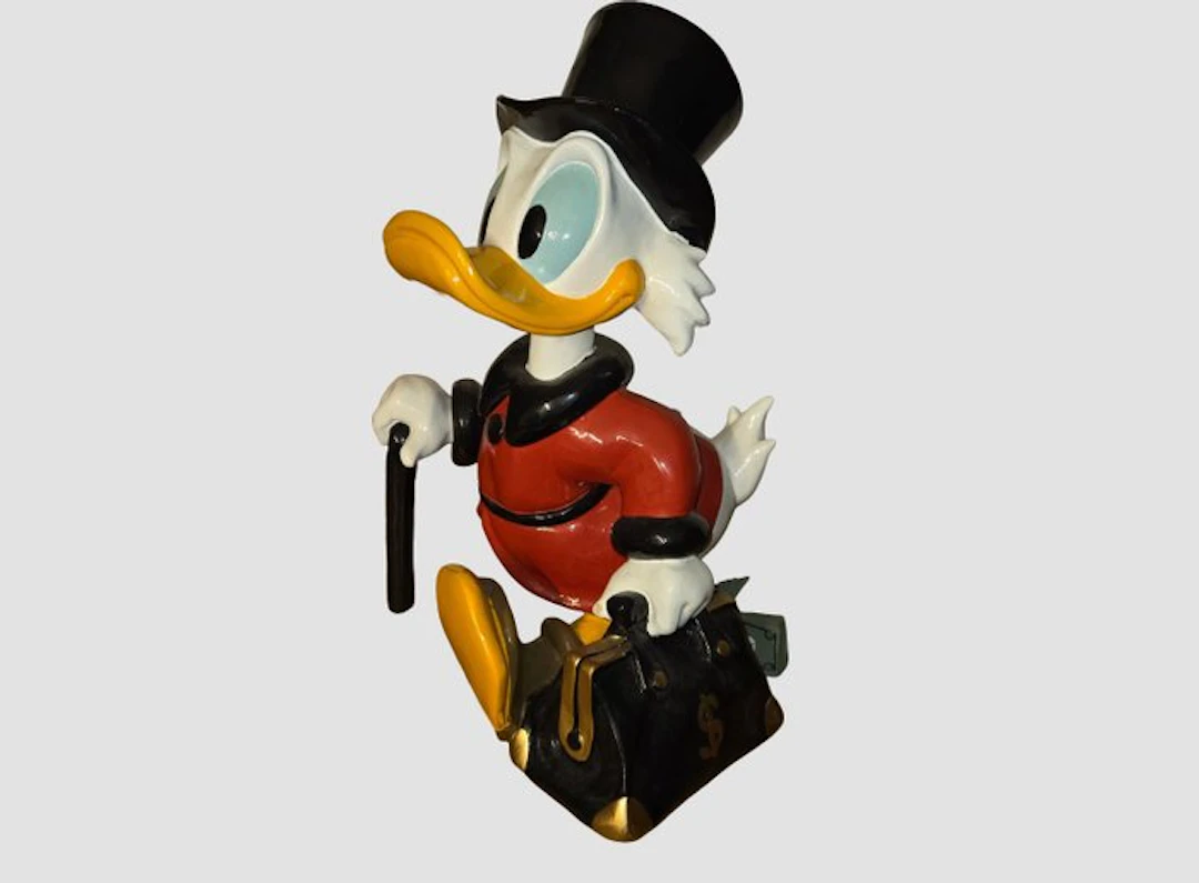 Figurine - Disney - Scrooge McDuck with a suitcase full...