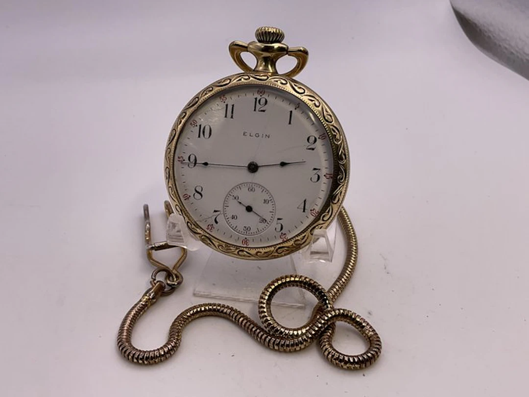 Elgin Laminato Oro 15 J . Cassa decorata . Con catena . 1900 - 1850-1900