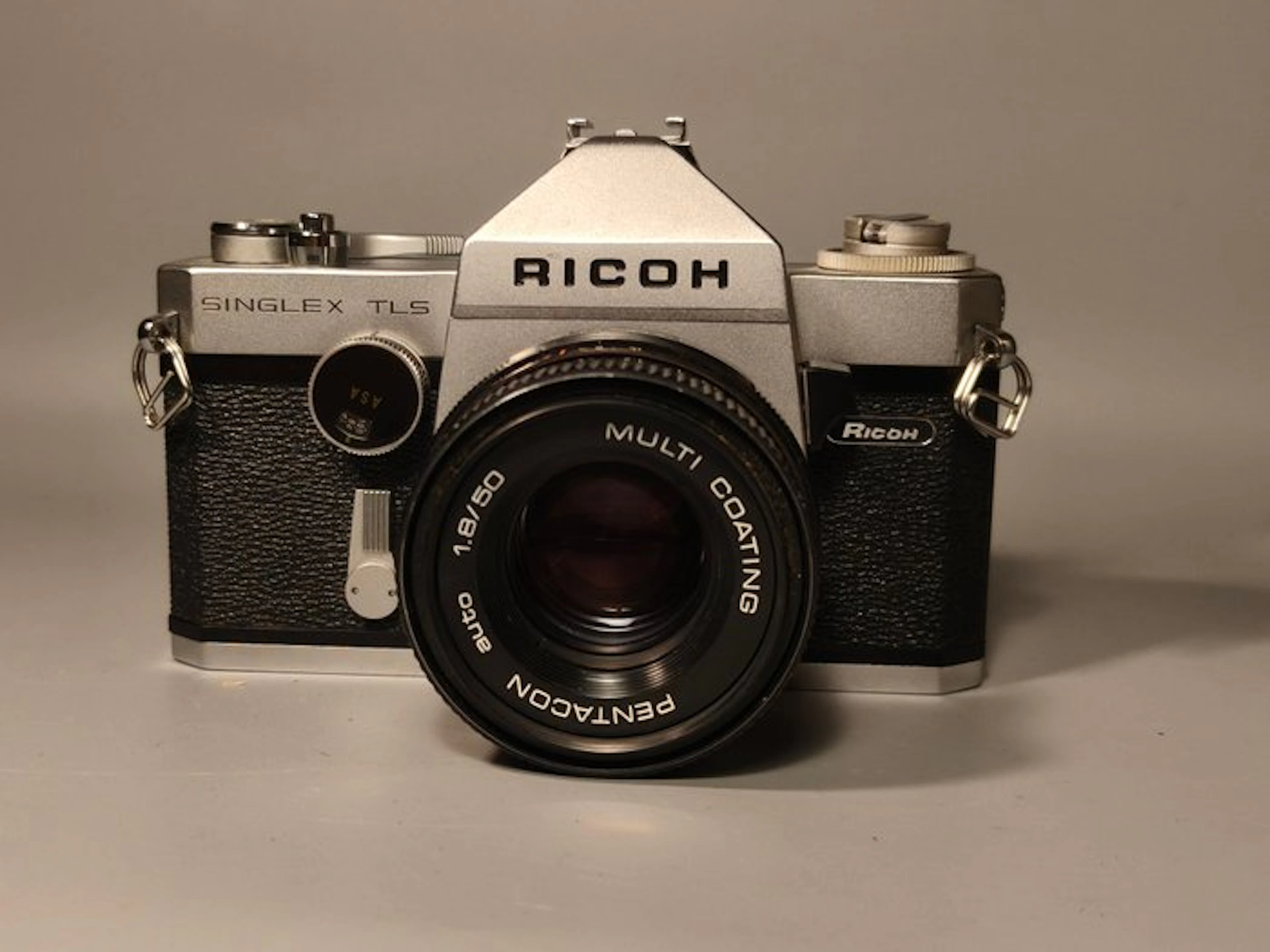 Ricoh Singlex TLS + Pentacon Auto 50 mm f/1.8 Analogue camera