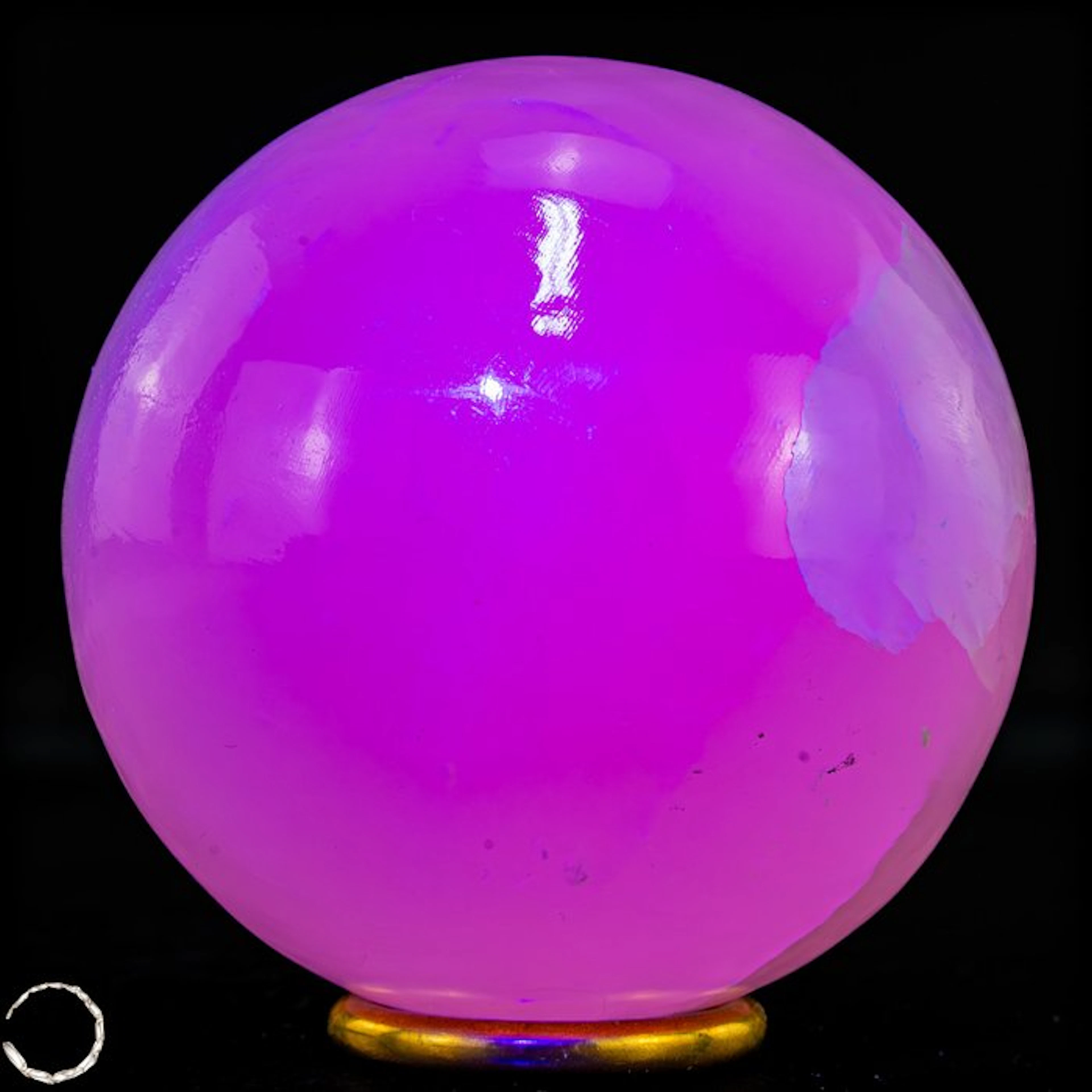 Natural aragonite sphere in soft pink with intense UV fluorescence- 1029.28 g