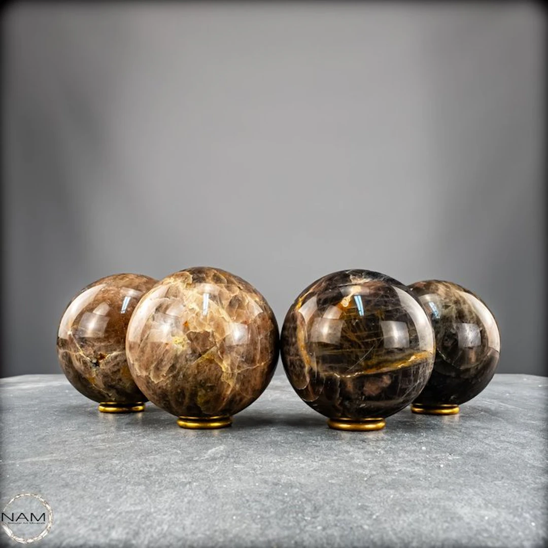 Moonstone ball set – 4 polished spheres with fascinating...