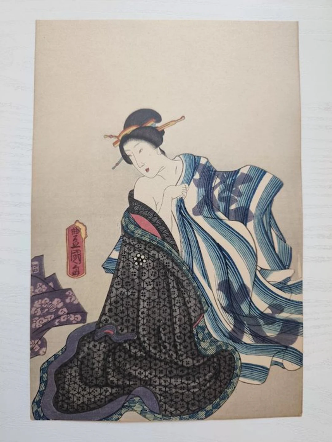 Clothes fluttering in the wind - Utagawa Kunisada...