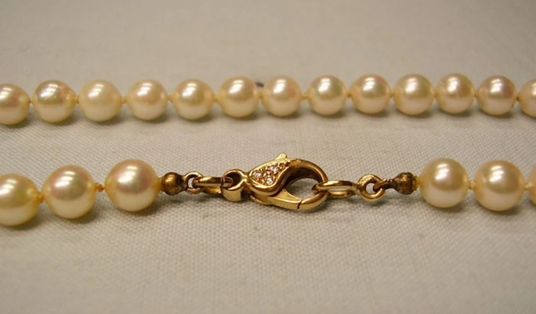 String of beads - 18 kt