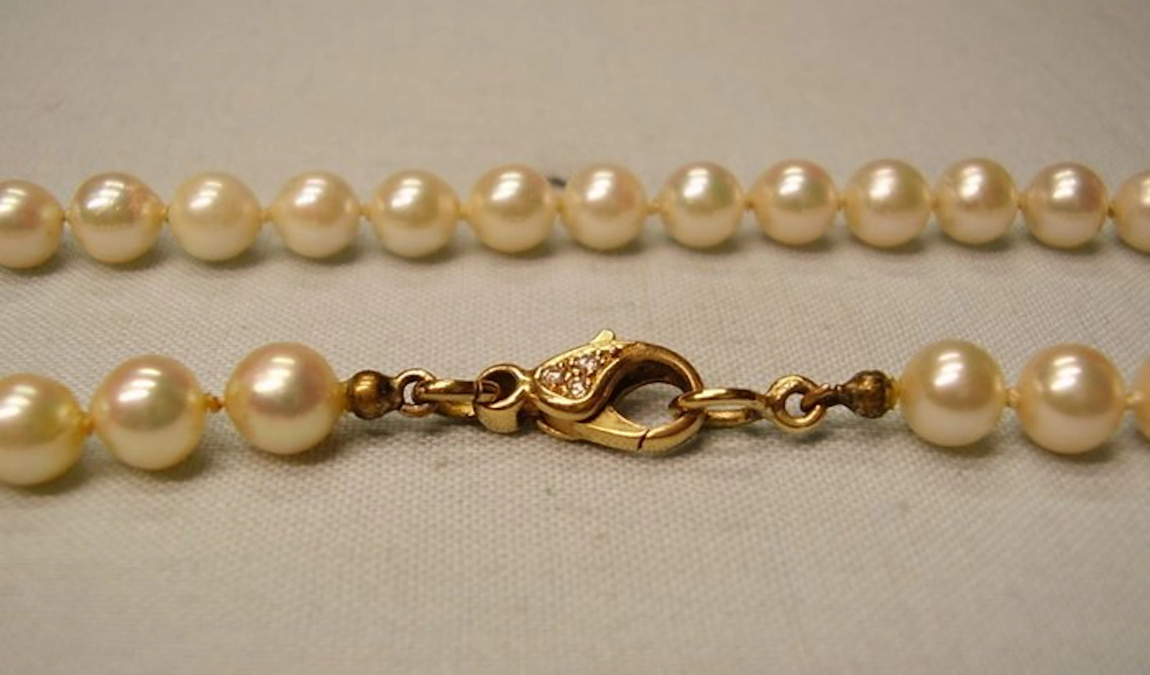 String of beads - 18 kt