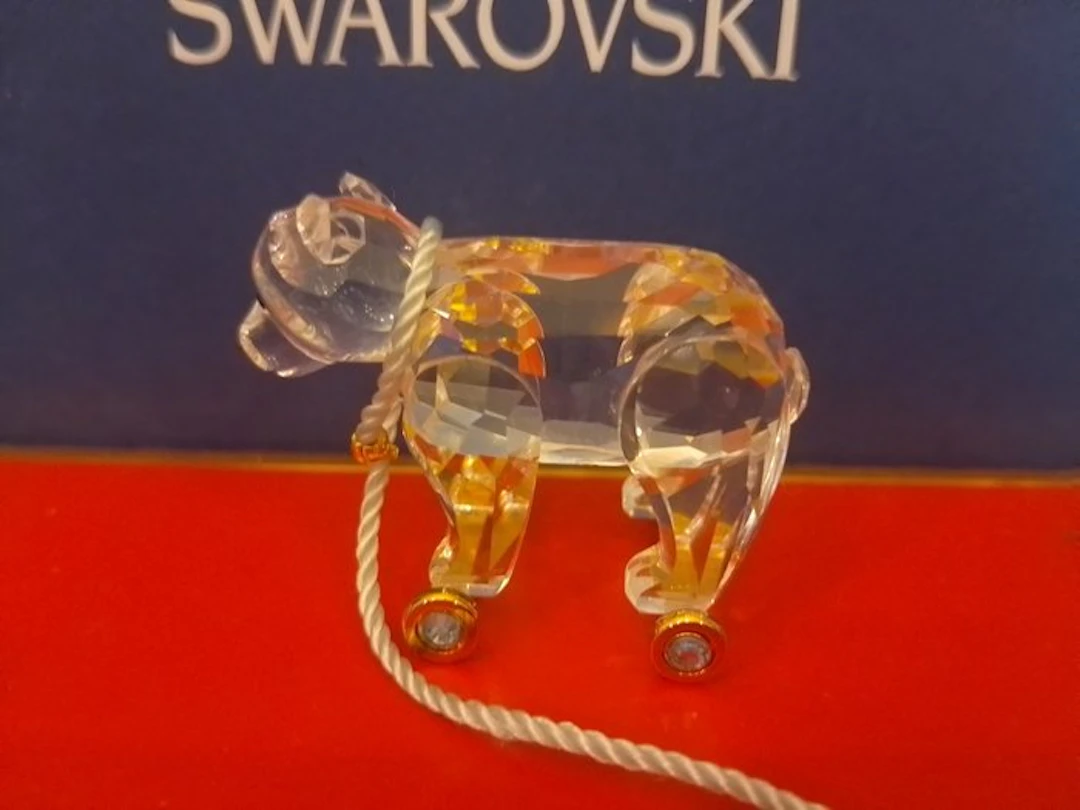 Swarovski - Figurine - Teddybear on Wheels - 253447 - Box - Crystal