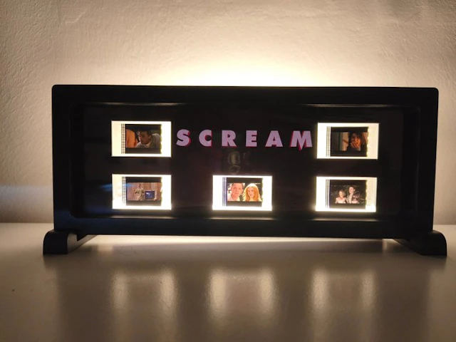 LightBoxFrame frame with 5 Backlit 35 mm film cells from...