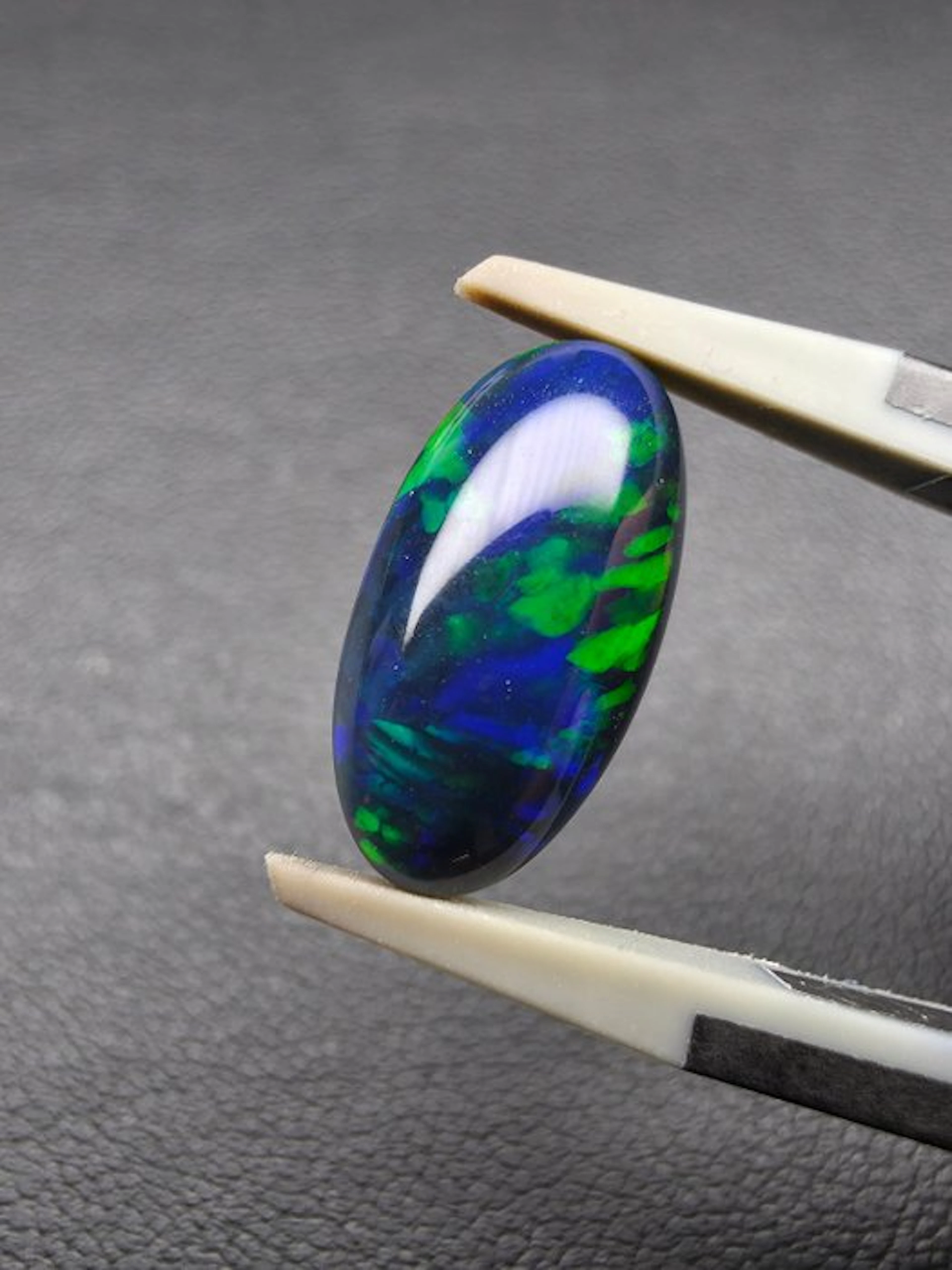2.35 cts Black Opal Cabochon- 0.47 g