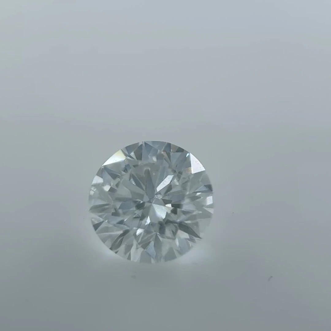 1 pcs Diamond (Natural) - 0.70 ct - Round - E - SI2...