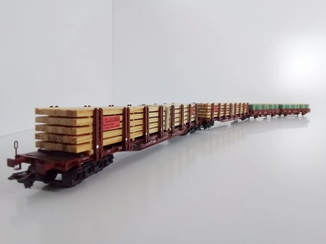 Märklin H0 - 46975/47714 - Model train (4) - 4 trolley carts loaded with wood.