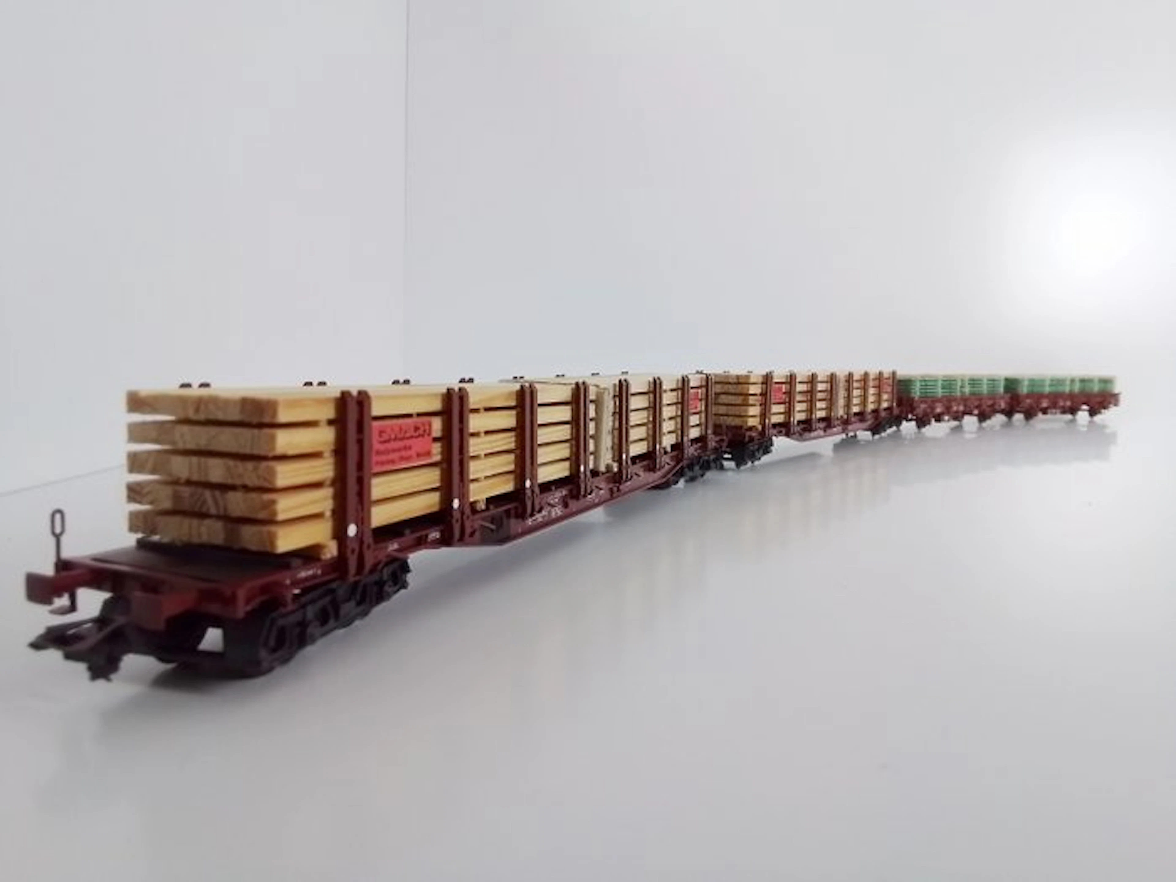 Märklin H0 - 46975/47714 - Model train (4) - 4 trolley carts loaded with wood.
