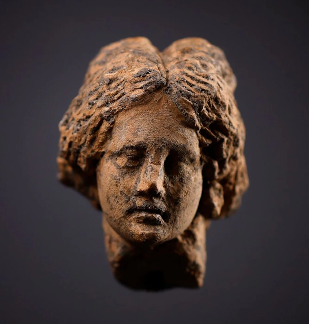 Ancient Greece, female terracotta head - 3.5 cm