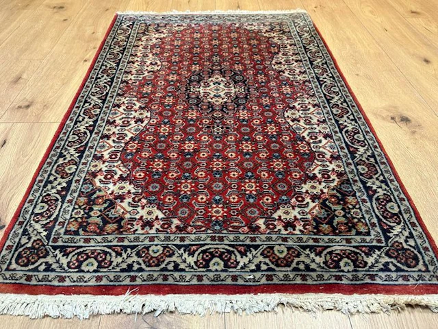 Beautiful hand-knotted Indo-Tabriz Oriental rug with a fine medallion