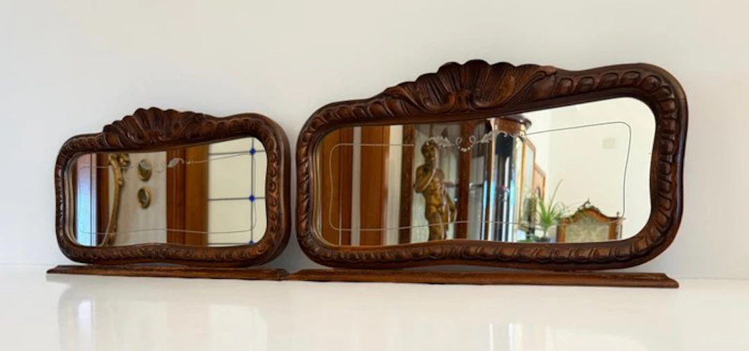 Wall mirror (2) - For support - carved in a volute and...